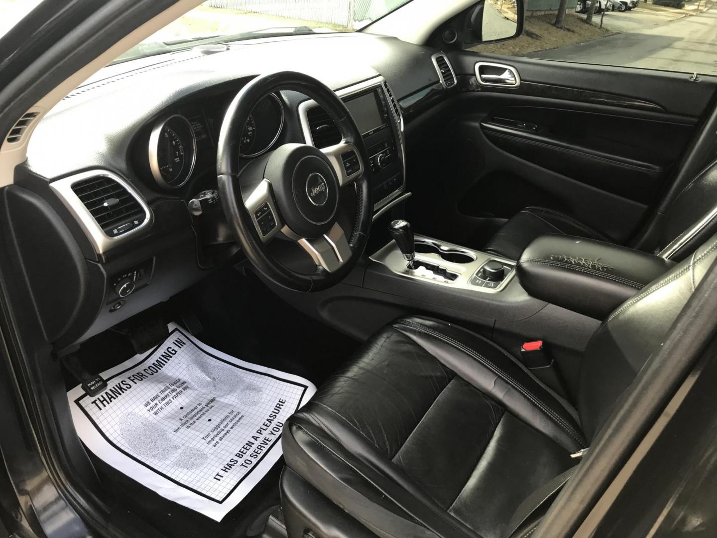 2011 Black /Black Jeep Grand Cherokee Laredo 4WD (1J4RR4GG9BC) with an 3.6L V6 DOHC 24V engine, 5-Speed Automatic transmission, located at 577 Chester Pike, Prospect Park, PA, 19076, (610) 237-1015, 39.886154, -75.302338 - Photo#10