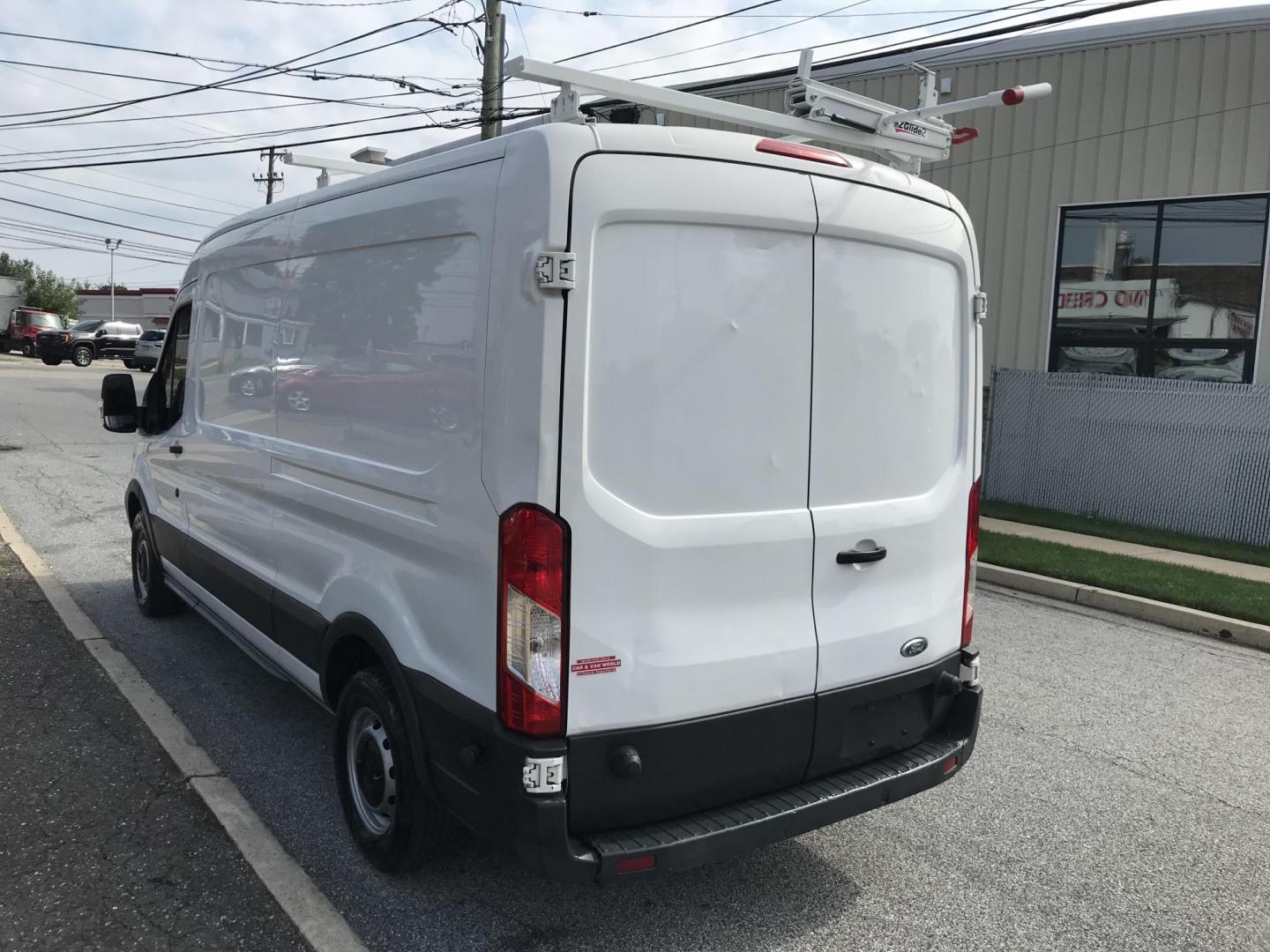 2015 White /Gray Ford Transit 150 Van Med. Roof 148-in. WB (1FTNE2CM7FK) with an 3.7L V6 DOHC 24V engine, 6-Speed Automatic transmission, located at 577 Chester Pike, Prospect Park, PA, 19076, (610) 237-1015, 39.886154, -75.302338 - 15 Ford Transit 150 Cargo Van: Medium Roof, ladder racks, bulkhead, new PA inspection, FLEET MAINTAINED! This vehicle comes inspected and has been given a bumper to bumper safety check. It is very clean, reliable, and well maintained. We offer a unique pay plan that is known for being the easiest - Photo#3