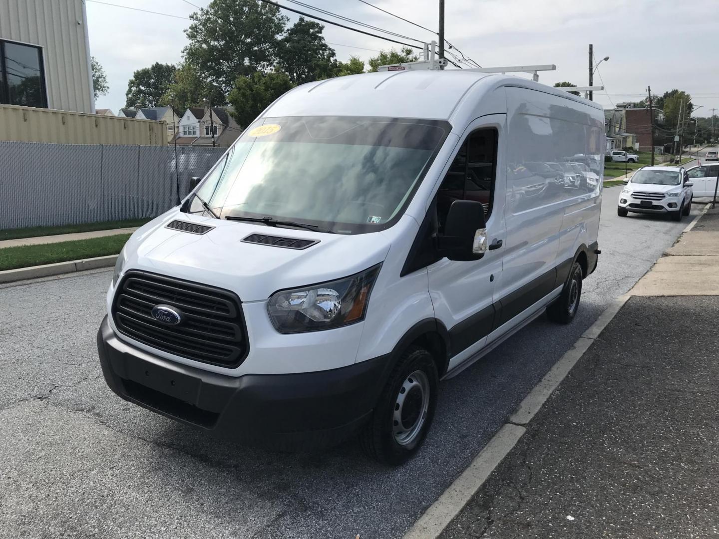 2015 White /Gray Ford Transit 150 Van Med. Roof 148-in. WB (1FTNE2CM7FK) with an 3.7L V6 DOHC 24V engine, 6-Speed Automatic transmission, located at 577 Chester Pike, Prospect Park, PA, 19076, (610) 237-1015, 39.886154, -75.302338 - 15 Ford Transit 150 Cargo Van: Medium Roof, ladder racks, bulkhead, new PA inspection, FLEET MAINTAINED! This vehicle comes inspected and has been given a bumper to bumper safety check. It is very clean, reliable, and well maintained. We offer a unique pay plan that is known for being the easiest - Photo#5