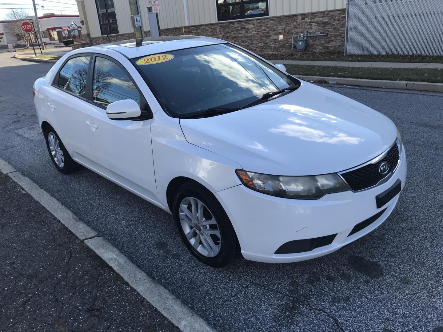 2012 White /Gray Kia Forte EX (KNAFU4A2XC5) with an 2.0L L4 DOHC 16V engine, Automatic transmission, located at 577 Chester Pike, Prospect Park, PA, 19076, (610) 237-1015, 39.886154, -75.302338 - Photo#3