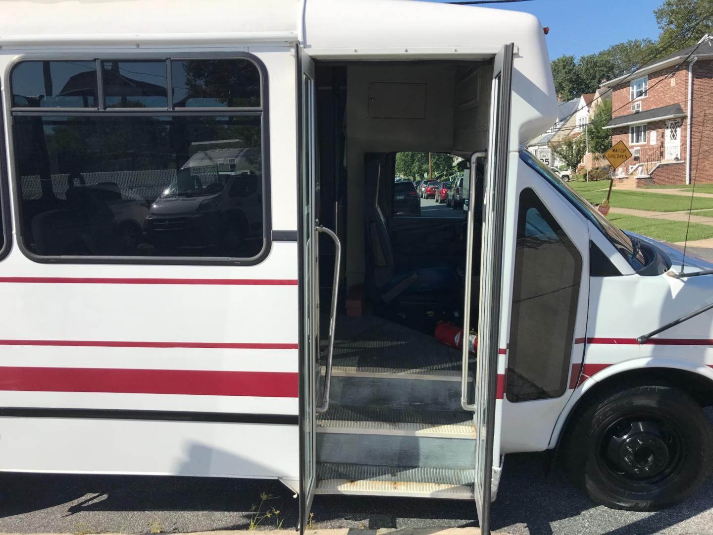 2012 White /Gray Chevrolet Express 3500 BUS (1GB3G3BLXC1) with an 6.6L engine, Automatic transmission, located at 577 Chester Pike, Prospect Park, PA, 19076, (610) 237-1015, 39.886154, -75.302338 - Photo#13