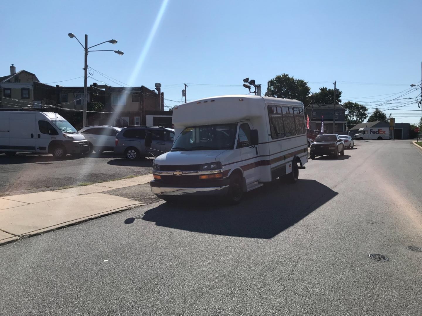 2012 White /Gray Chevrolet Express 3500 BUS (1GB3G3BLXC1) with an 6.6L engine, Automatic transmission, located at 577 Chester Pike, Prospect Park, PA, 19076, (610) 237-1015, 39.886154, -75.302338 - Photo#1