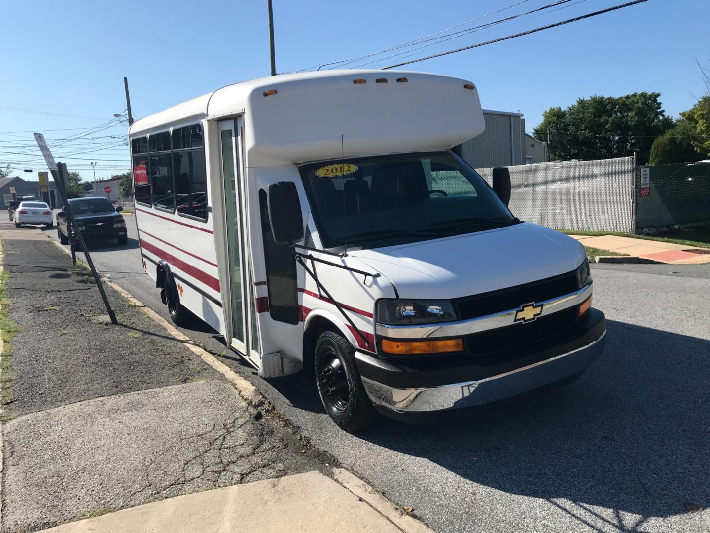 2012 White /Gray Chevrolet Express 3500 BUS (1GB3G3BLXC1) with an 6.6L engine, Automatic transmission, located at 577 Chester Pike, Prospect Park, PA, 19076, (610) 237-1015, 39.886154, -75.302338 - Photo#3