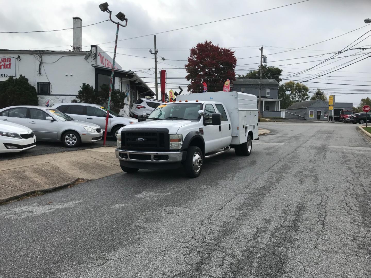 2009 White /Tan Ford F-550 Crew Cab 4WD DRW (1FDAW57R79E) with an 6.4L V8 OHV 32V TURBO DIESEL engine, Automatic transmission, located at 577 Chester Pike, Prospect Park, PA, 19076, (610) 237-1015, 39.886154, -75.302338 - 09 Ford F550 Crew Cab Turbo Diesel: 4x4, turbo diesel, dual rear wheels, 4 door, work box on back with side bins, ladder racks, runs EXCELLENT! - Photo#1