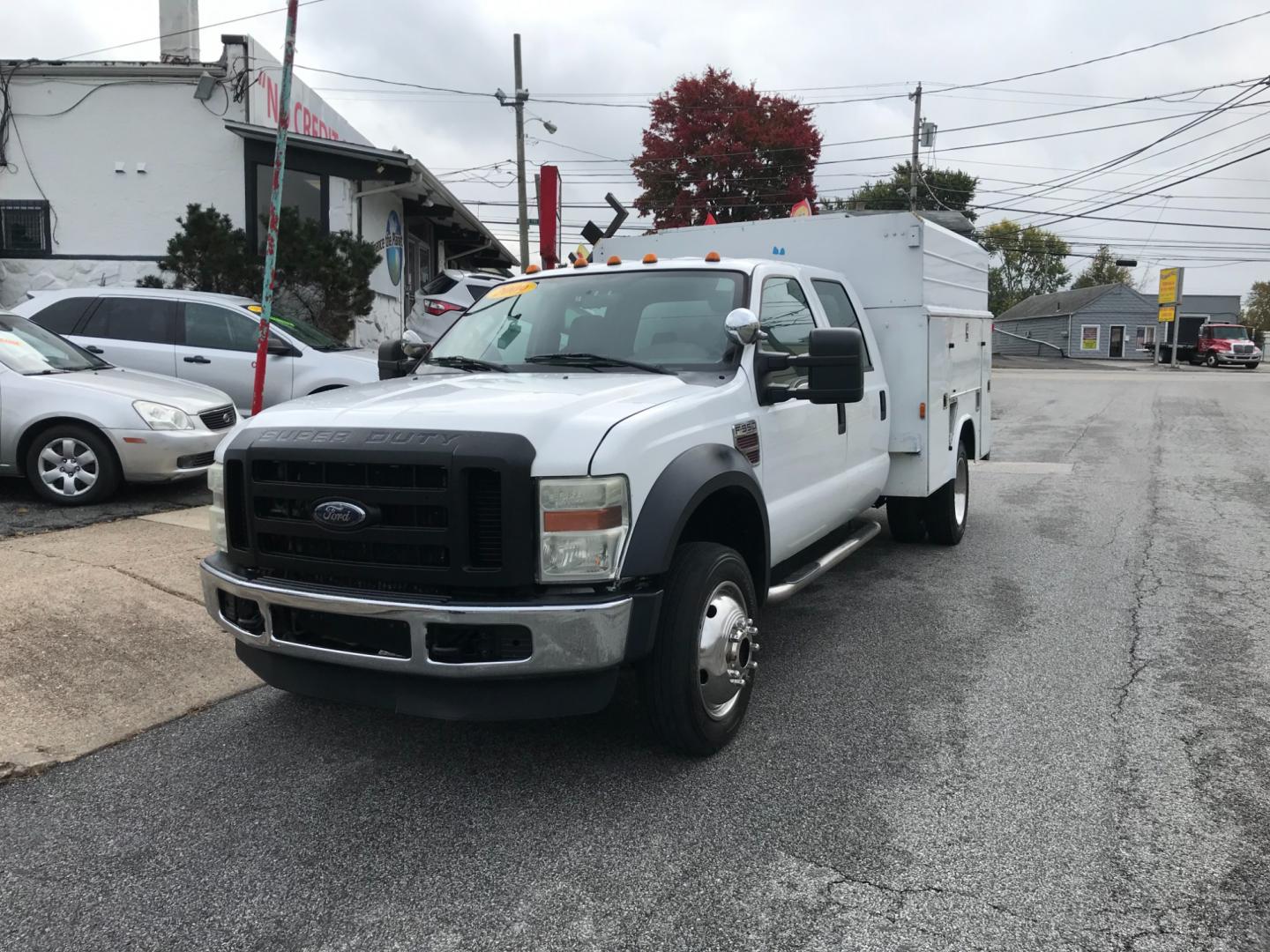 2009 White /Tan Ford F-550 Crew Cab 4WD DRW (1FDAW57R79E) with an 6.4L V8 OHV 32V TURBO DIESEL engine, Automatic transmission, located at 577 Chester Pike, Prospect Park, PA, 19076, (610) 237-1015, 39.886154, -75.302338 - 09 Ford F550 Crew Cab Turbo Diesel: 4x4, turbo diesel, dual rear wheels, 4 door, work box on back with side bins, ladder racks, runs EXCELLENT! - Photo#2