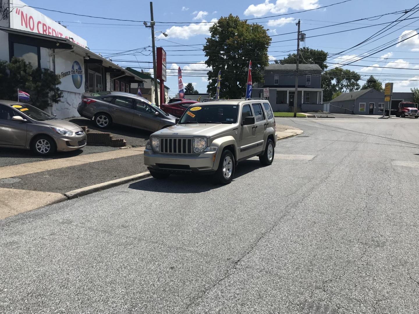 2011 Gold /Gray Jeep Liberty Sport (1J4PN2GK1BW) with an 3.7 V6 engine, Automatic transmission, located at 577 Chester Pike, Prospect Park, PA, 19076, (610) 237-1015, 39.886154, -75.302338 - Photo#1