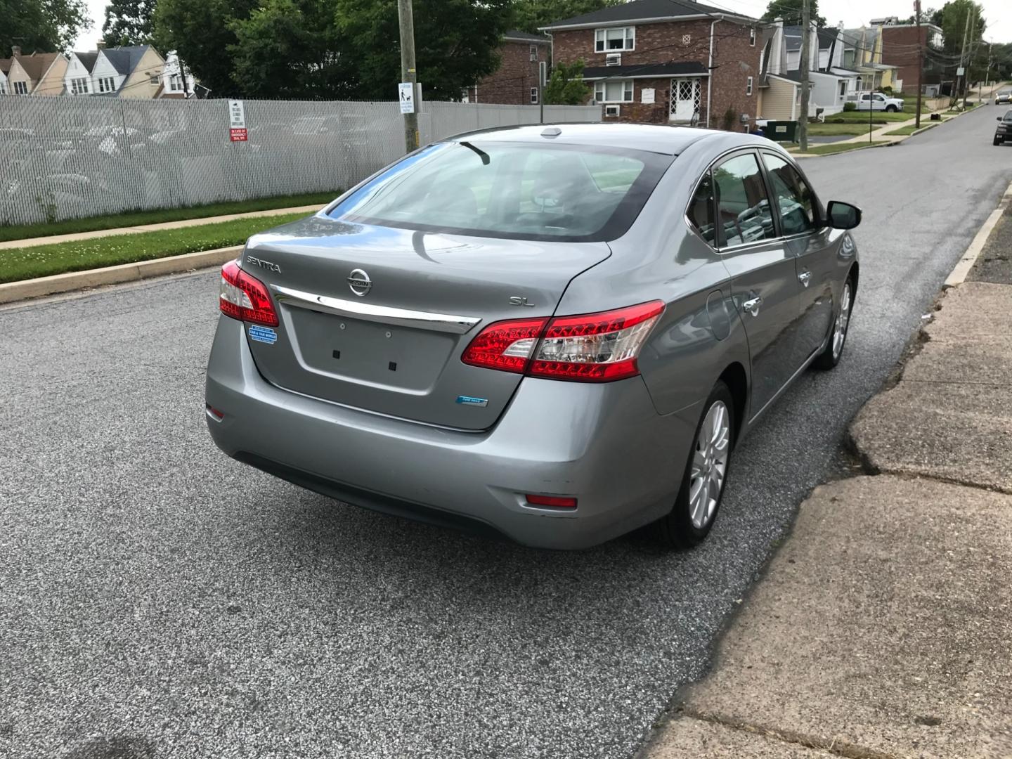 2013 Silver /Gray Nissan Sentra SL (3N1AB7AP8DL) with an 1.8 V4 engine, Automatic transmission, located at 577 Chester Pike, Prospect Park, PA, 19076, (610) 237-1015, 39.886154, -75.302338 - Photo#4