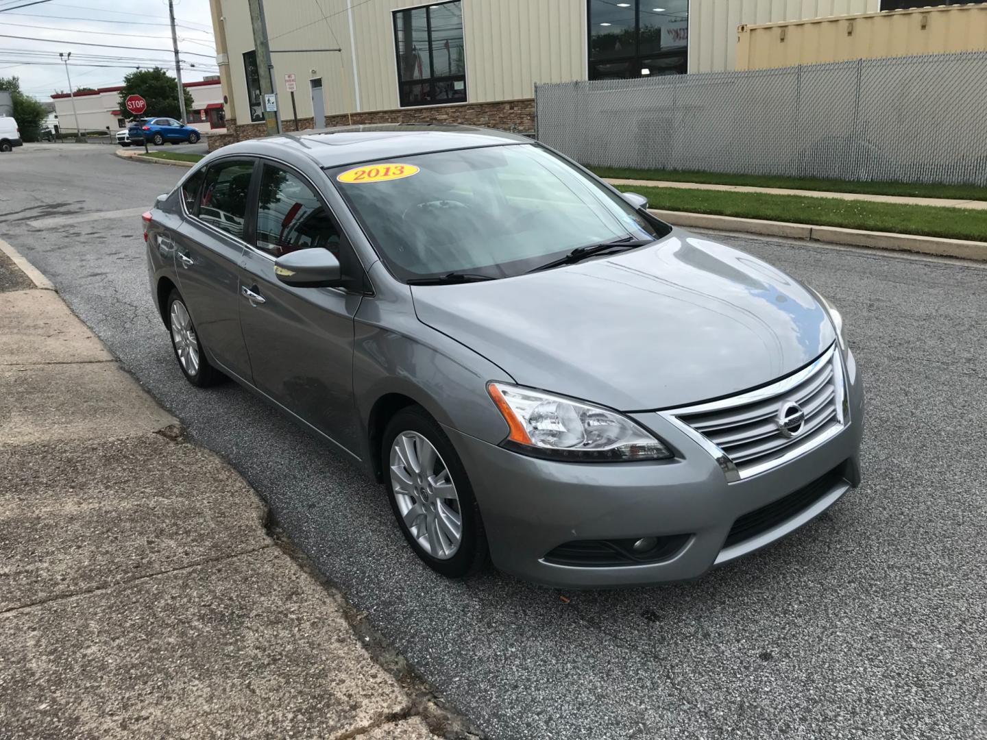 2013 Silver /Gray Nissan Sentra SL (3N1AB7AP8DL) with an 1.8 V4 engine, Automatic transmission, located at 577 Chester Pike, Prospect Park, PA, 19076, (610) 237-1015, 39.886154, -75.302338 - Photo#3