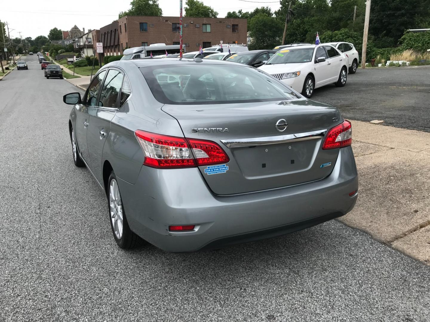 2013 Silver /Gray Nissan Sentra SL (3N1AB7AP8DL) with an 1.8 V4 engine, Automatic transmission, located at 577 Chester Pike, Prospect Park, PA, 19076, (610) 237-1015, 39.886154, -75.302338 - Photo#5