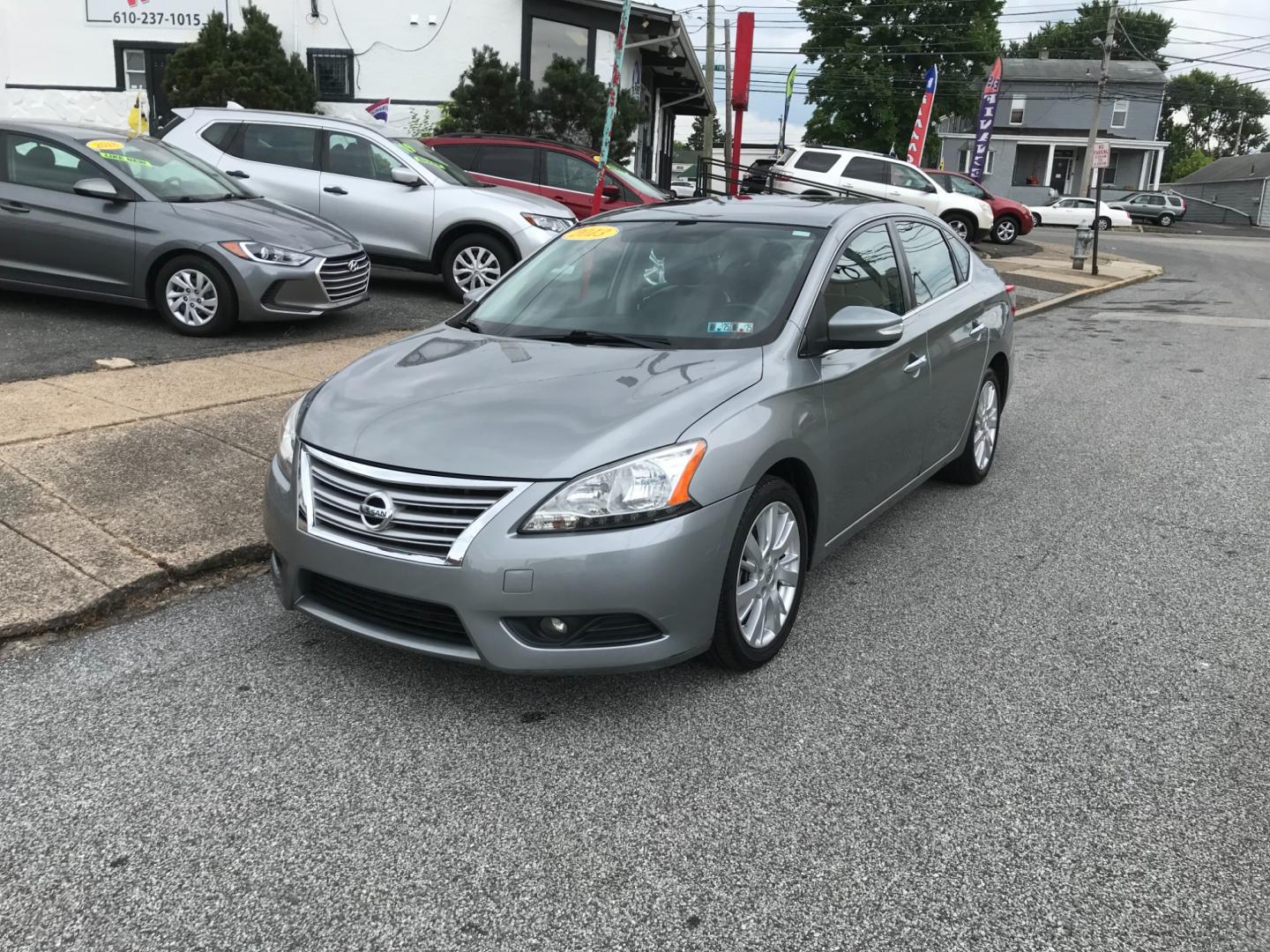 2013 Silver /Gray Nissan Sentra SL (3N1AB7AP8DL) with an 1.8 V4 engine, Automatic transmission, located at 577 Chester Pike, Prospect Park, PA, 19076, (610) 237-1015, 39.886154, -75.302338 - Photo#2