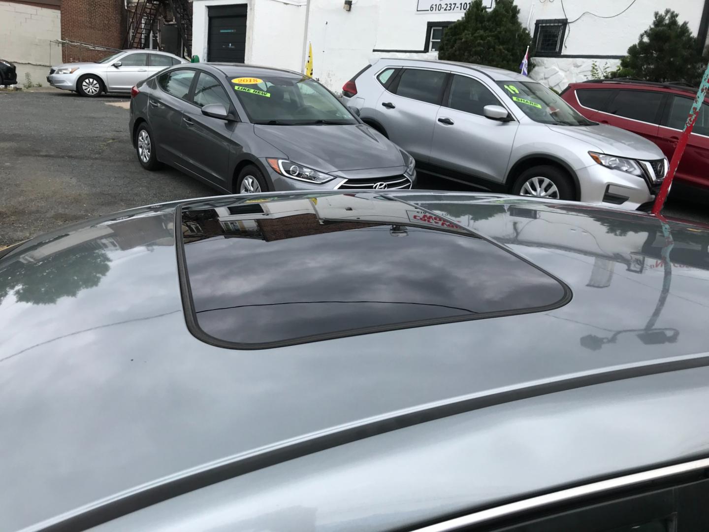 2013 Silver /Gray Nissan Sentra SL (3N1AB7AP8DL) with an 1.8 V4 engine, Automatic transmission, located at 577 Chester Pike, Prospect Park, PA, 19076, (610) 237-1015, 39.886154, -75.302338 - Photo#7