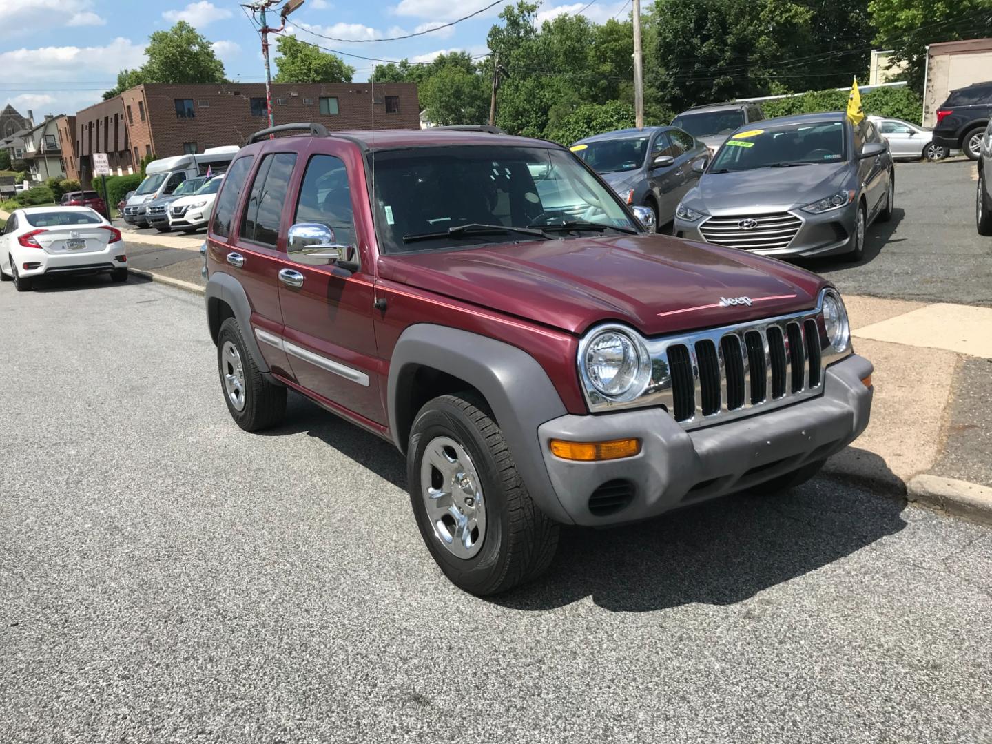 2002 Red /Gray Jeep Liberty Sport (1J4GL48K32W) with an 3.7 V6 engine, Automatic transmission, located at 577 Chester Pike, Prospect Park, PA, 19076, (610) 237-1015, 39.886154, -75.302338 - Photo#2