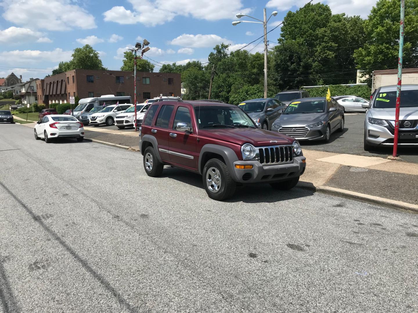 2002 Red /Gray Jeep Liberty Sport (1J4GL48K32W) with an 3.7 V6 engine, Automatic transmission, located at 577 Chester Pike, Prospect Park, PA, 19076, (610) 237-1015, 39.886154, -75.302338 - 2002 Jeep Liberty Sport: Only 130k miles, 5/24 PA inspection, nice radio, runs GREAT! *Vehicle sold as-is* - Photo#1