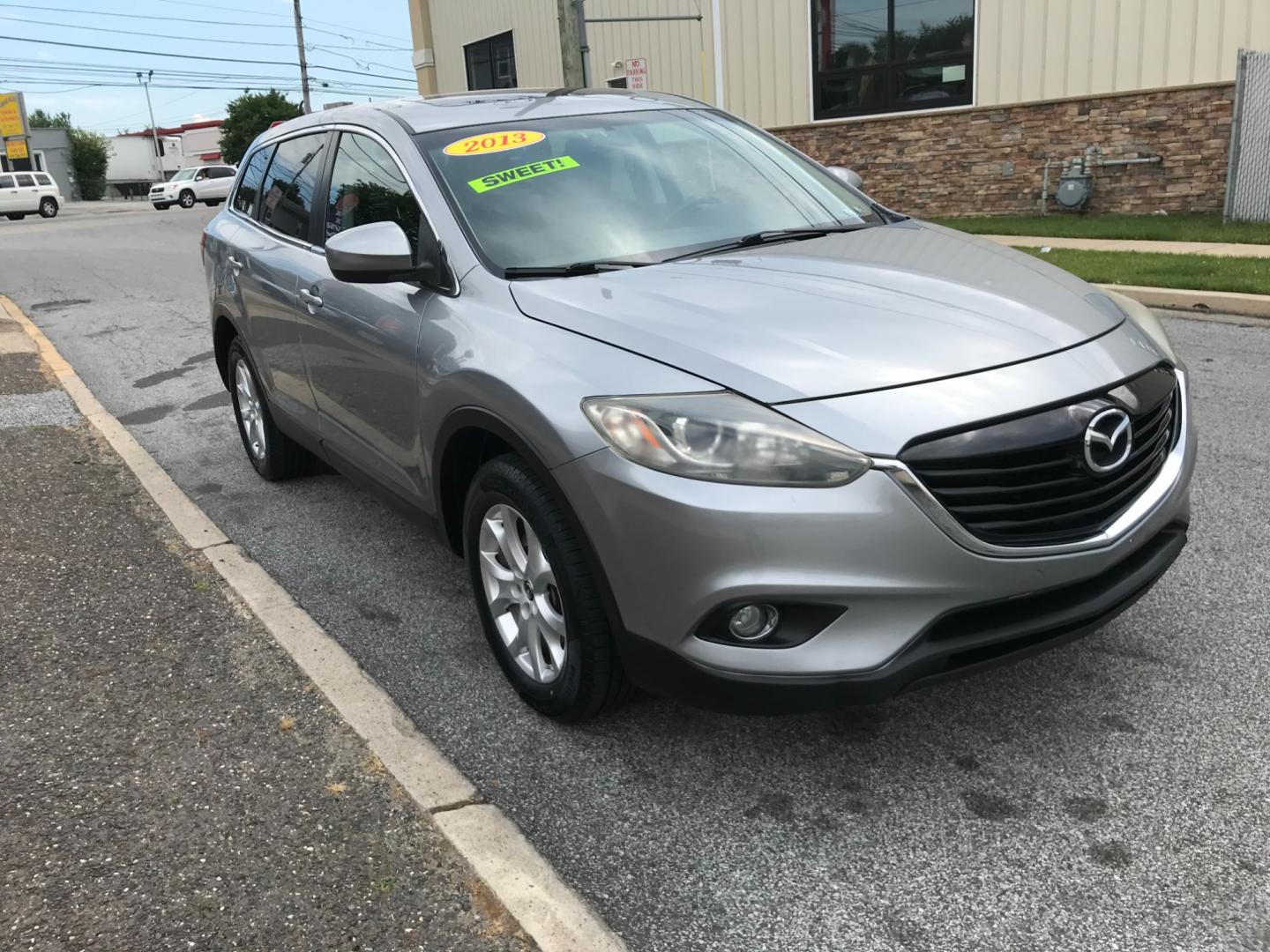 2013 Silver /Black Mazda CX-9 Touring (JM3TB3CV6D0) with an 3.7 V6 engine, Automatic transmission, located at 577 Chester Pike, Prospect Park, PA, 19076, (610) 237-1015, 39.886154, -75.302338 - 2013 Mazda CX-9: Only 133k miles, 3rd row seating, AWD, backup camera, sunroof, runs LIKE NEW! This vehicle comes inspected and has been given a bumper to bumper safety check. It is very clean, reliable, and well maintained. We offer a unique pay plan that is known for being the easiest and faste - Photo#3