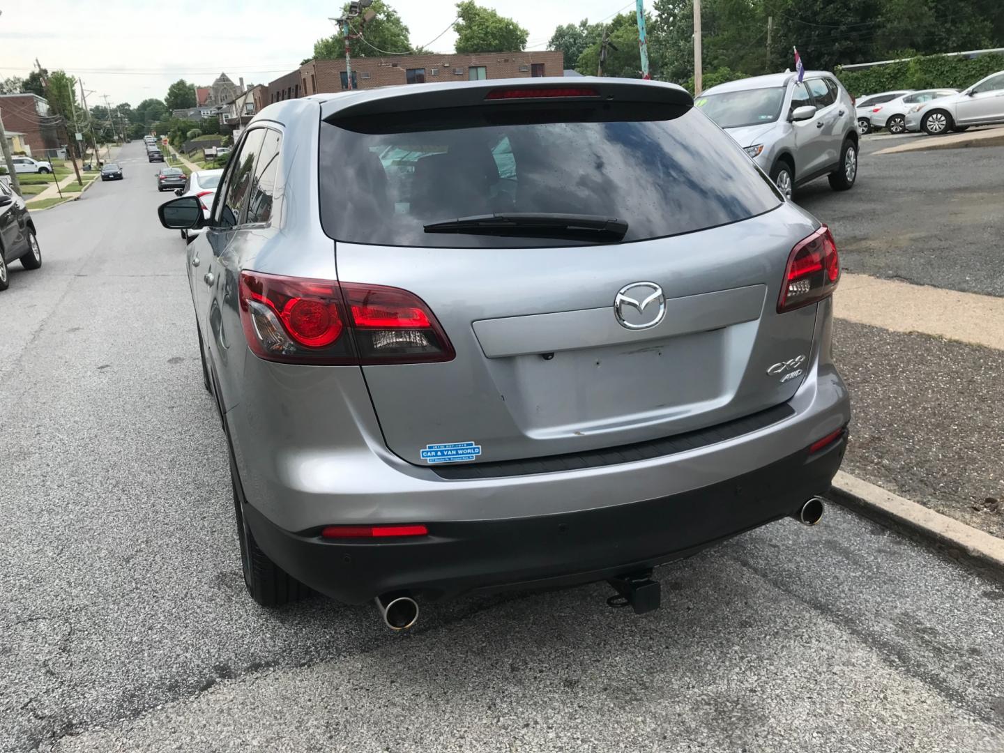 2013 Silver /Black Mazda CX-9 Touring (JM3TB3CV6D0) with an 3.7 V6 engine, Automatic transmission, located at 577 Chester Pike, Prospect Park, PA, 19076, (610) 237-1015, 39.886154, -75.302338 - 2013 Mazda CX-9: Only 133k miles, 3rd row seating, AWD, backup camera, sunroof, runs LIKE NEW! This vehicle comes inspected and has been given a bumper to bumper safety check. It is very clean, reliable, and well maintained. We offer a unique pay plan that is known for being the easiest and faste - Photo#5