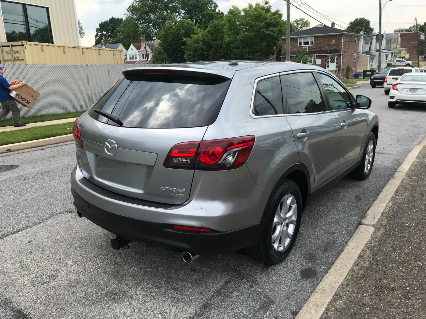 2013 Silver /Black Mazda CX-9 Touring (JM3TB3CV6D0) with an 3.7 V6 engine, Automatic transmission, located at 577 Chester Pike, Prospect Park, PA, 19076, (610) 237-1015, 39.886154, -75.302338 - 2013 Mazda CX-9: Only 133k miles, 3rd row seating, AWD, backup camera, sunroof, runs LIKE NEW! This vehicle comes inspected and has been given a bumper to bumper safety check. It is very clean, reliable, and well maintained. We offer a unique pay plan that is known for being the easiest and faste - Photo#4