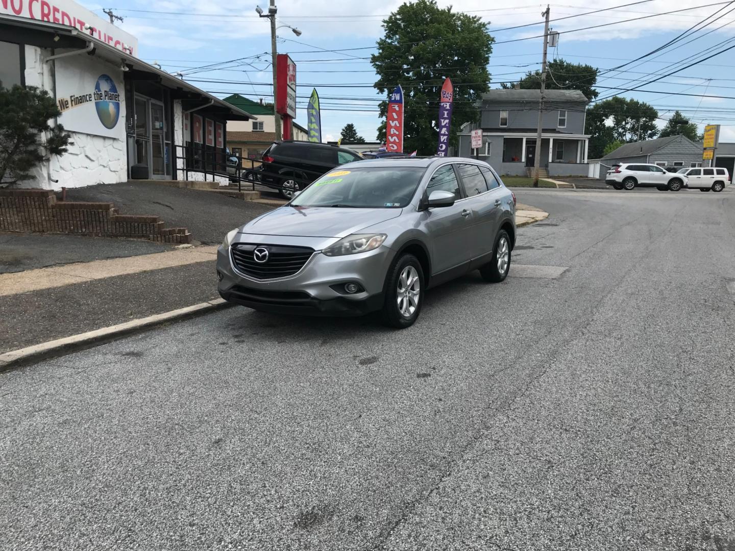 2013 Silver /Black Mazda CX-9 Touring (JM3TB3CV6D0) with an 3.7 V6 engine, Automatic transmission, located at 577 Chester Pike, Prospect Park, PA, 19076, (610) 237-1015, 39.886154, -75.302338 - 2013 Mazda CX-9: Only 133k miles, 3rd row seating, AWD, backup camera, sunroof, runs LIKE NEW! This vehicle comes inspected and has been given a bumper to bumper safety check. It is very clean, reliable, and well maintained. We offer a unique pay plan that is known for being the easiest and faste - Photo#1