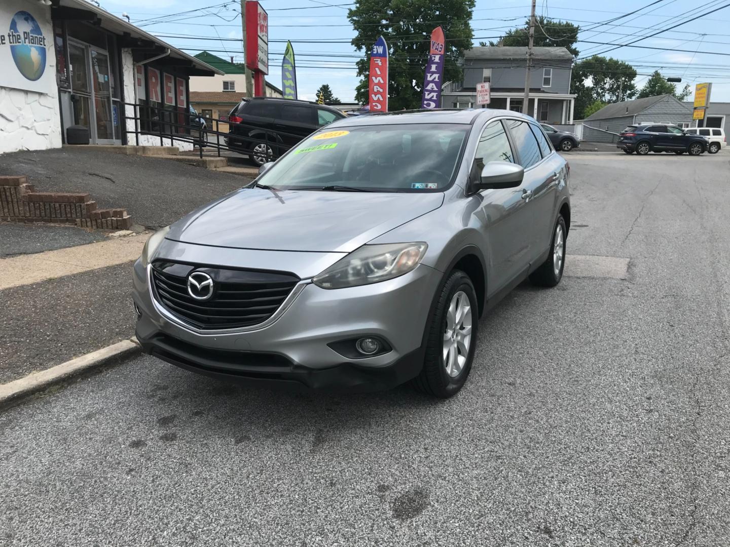 2013 Silver /Black Mazda CX-9 Touring (JM3TB3CV6D0) with an 3.7 V6 engine, Automatic transmission, located at 577 Chester Pike, Prospect Park, PA, 19076, (610) 237-1015, 39.886154, -75.302338 - 2013 Mazda CX-9: Only 133k miles, 3rd row seating, AWD, backup camera, sunroof, runs LIKE NEW! This vehicle comes inspected and has been given a bumper to bumper safety check. It is very clean, reliable, and well maintained. We offer a unique pay plan that is known for being the easiest and faste - Photo#2