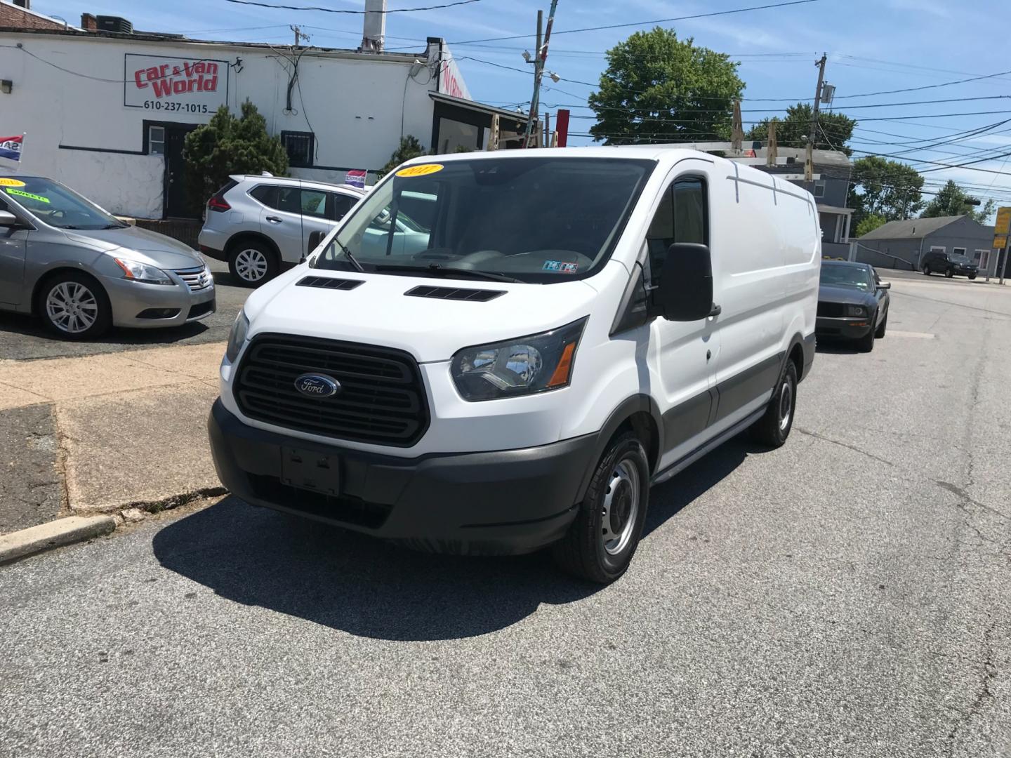 2017 White /Gray Ford Transit 150 (1FTYE1ZM2HK) with an 3.7 V6 engine, Automatic transmission, located at 577 Chester Pike, Prospect Park, PA, 19076, (610) 237-1015, 39.886154, -75.302338 - 2017 Ford Transit 150 Low Roof: Ladder racks, multiple pieces of shelving, backup camera, no side or rear windows, backup camera, new PA inspection, FLEET MAINTAINED! This vehicle comes inspected and has been given a bumper to bumper safety check. It is very clean, reliable, and well maintained. - Photo#2