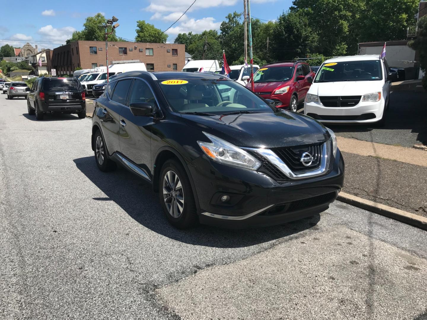 2017 Black /Tan Nissan Murano SL (5N1AZ2MH6HN) with an 3.5 V6 engine, Automatic transmission, located at 577 Chester Pike, Prospect Park, PA, 19076, (610) 237-1015, 39.886154, -75.302338 - 2017 Nissan Murano SL: big sunroof, navigation system, backup camera, new PA inspection, runs LIKE NEW! This vehicle comes inspected and has been given a bumper to bumper safety check. It is very clean, reliable, and well maintained. We offer a unique pay plan that is known for being the easiest - Photo#2