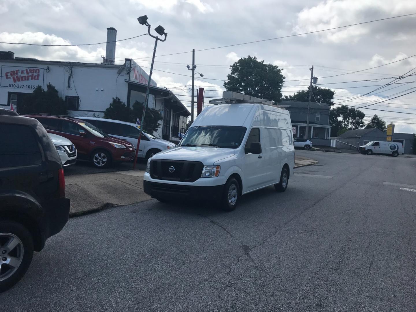 2018 White /Gray Nissan NV Cargo SV (1N6BF0LYXJN) with an 4.0 V6 engine, Automatic transmission, located at 577 Chester Pike, Prospect Park, PA, 19076, (610) 237-1015, 39.886154, -75.302338 - Photo#1