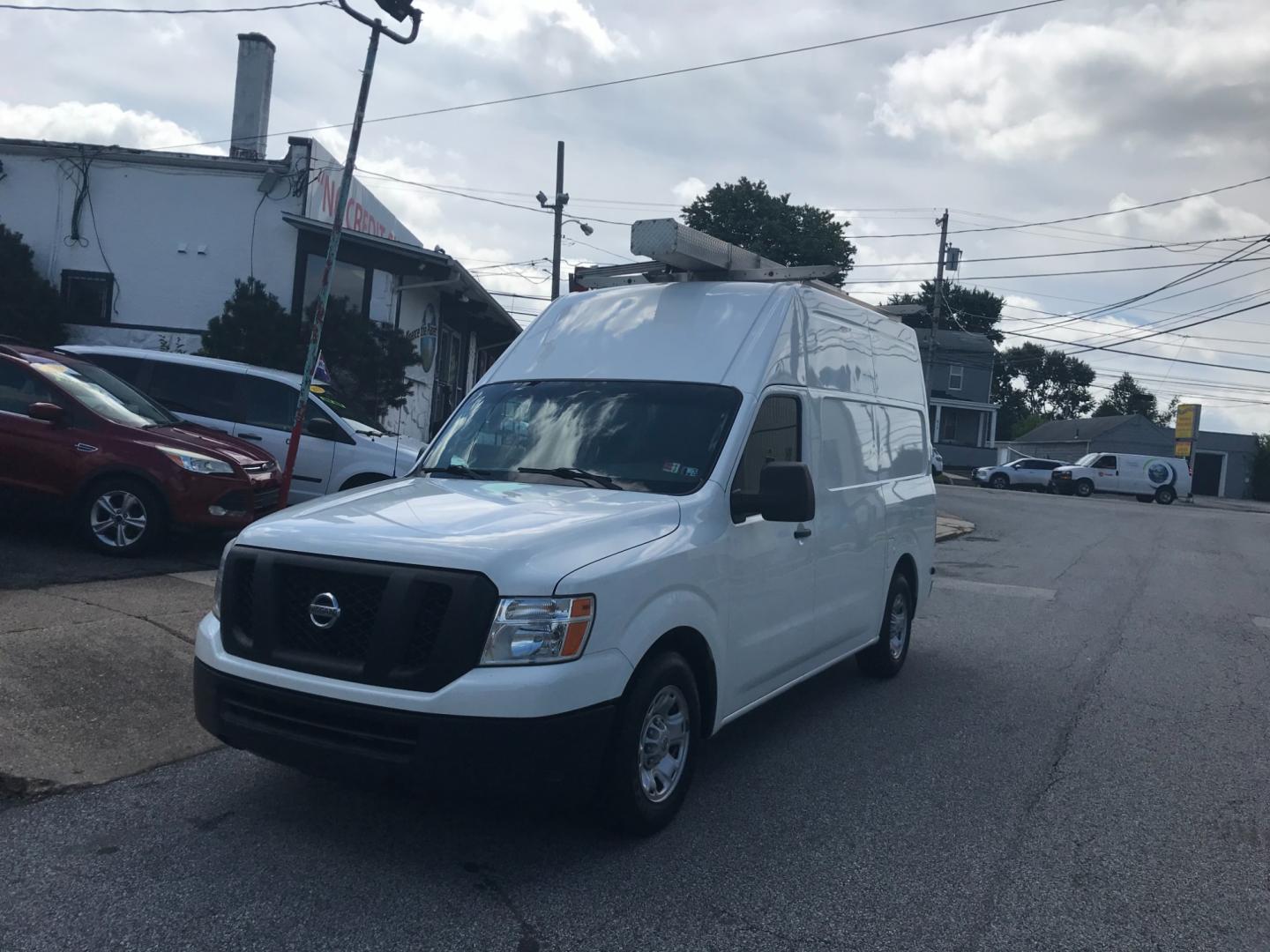 2018 White /Gray Nissan NV Cargo SV (1N6BF0LYXJN) with an 4.0 V6 engine, Automatic transmission, located at 577 Chester Pike, Prospect Park, PA, 19076, (610) 237-1015, 39.886154, -75.302338 - Photo#2