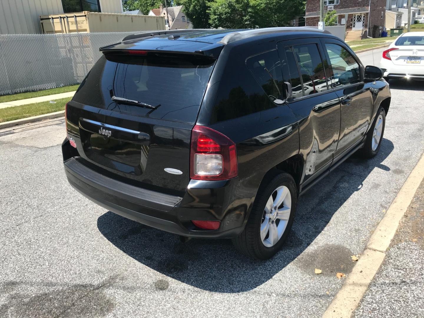 2015 Black /Gray Jeep Compass Latitude (1C4NJDEB2FD) with an 2.4 V4 engine, Automatic transmission, located at 577 Chester Pike, Prospect Park, PA, 19076, (610) 237-1015, 39.886154, -75.302338 - Photo#4