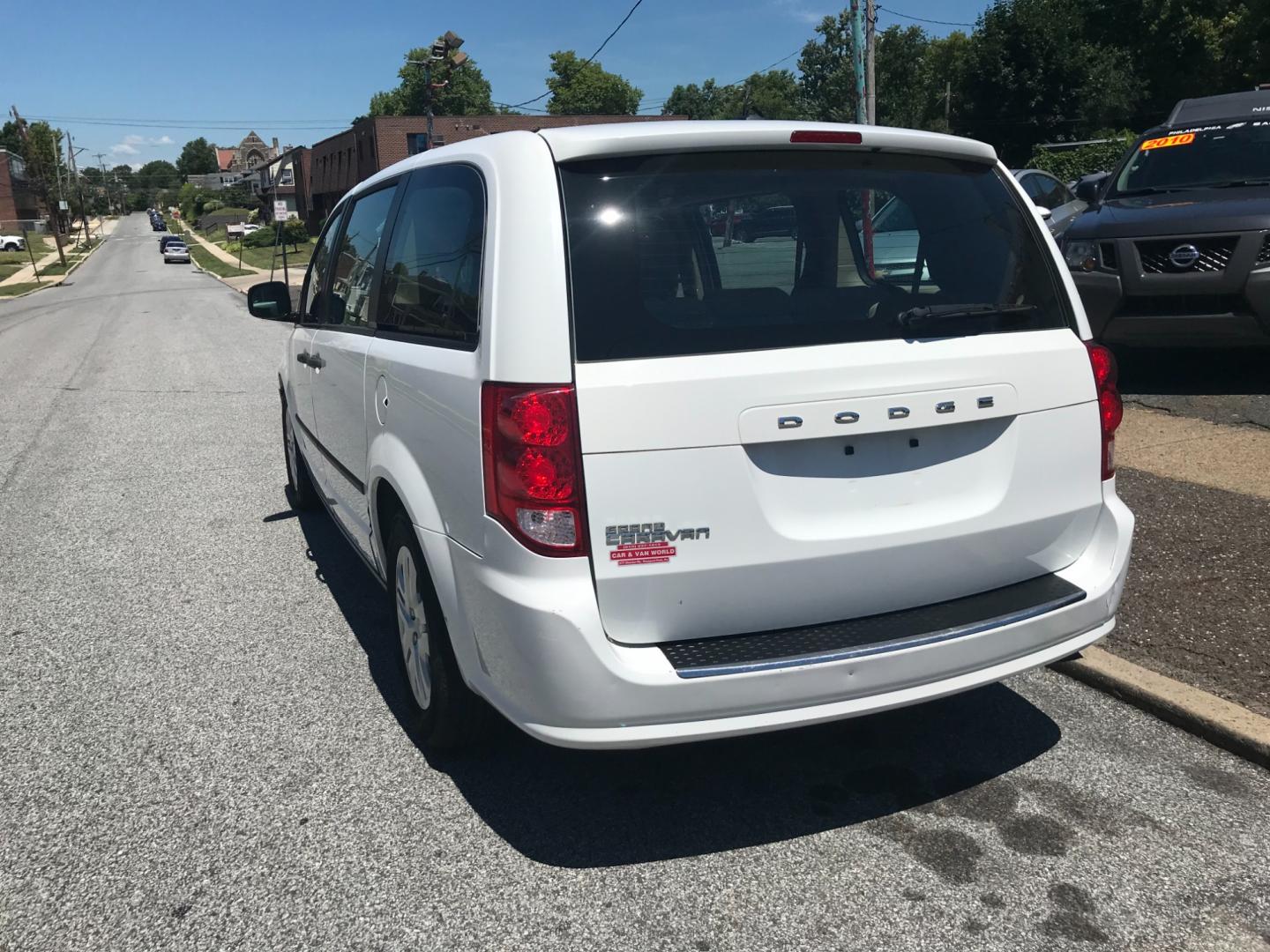 2015 White /Gray Dodge Grand Caravan SE (2C4RDGBG7FR) with an 3.6 V6 engine, Automatic transmission, located at 577 Chester Pike, Prospect Park, PA, 19076, (610) 237-1015, 39.886154, -75.302338 - 2015 Dodge Grand Caravan SE: Only 96k miles, new PA inspection, SUPER CLEAN, runs LIKE NEW! This vehicle comes inspected and has been given a bumper to bumper safety check. It is very clean, reliable, and well maintained. We offer a unique pay plan that is known for being the easiest and fastest - Photo#5