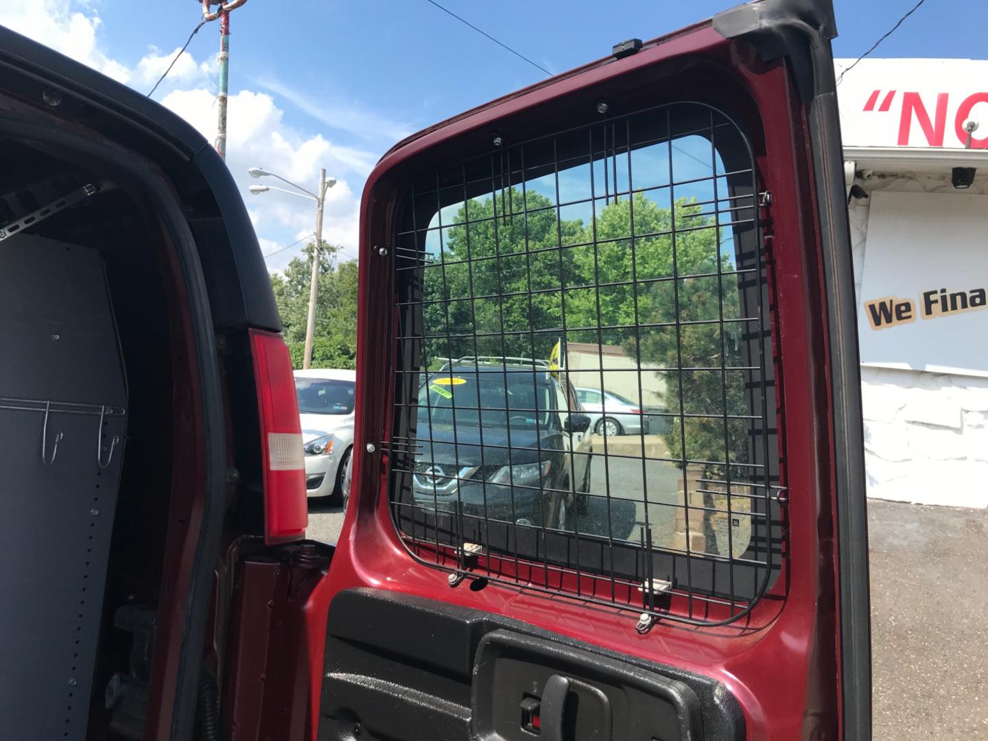 2014 Maroon /Gray GMC Savana 3500 (1GTZ7TCA0E1) with an 4.8 V8 engine, Automatic transmission, located at 577 Chester Pike, Prospect Park, PA, 19076, (610) 237-1015, 39.886154, -75.302338 - 2014 GMC Savana 3500 Cargo Van: Multiple pieces of shelving, partition with door, cages over all windows, new PA inspection, power locks and windows, FLEET MAINTAINED, runs LIKE NEW! This vehicle comes inspected and has been given a bumper to bumper safety check. It is very clean, reliable, and w - Photo#20