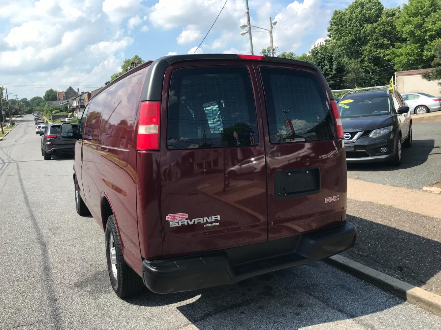 2014 Maroon /Gray GMC Savana 3500 (1GTZ7TCA0E1) with an 4.8 V8 engine, Automatic transmission, located at 577 Chester Pike, Prospect Park, PA, 19076, (610) 237-1015, 39.886154, -75.302338 - 2014 GMC Savana 3500 Cargo Van: Multiple pieces of shelving, partition with door, cages over all windows, new PA inspection, power locks and windows, FLEET MAINTAINED, runs LIKE NEW! This vehicle comes inspected and has been given a bumper to bumper safety check. It is very clean, reliable, and w - Photo#5