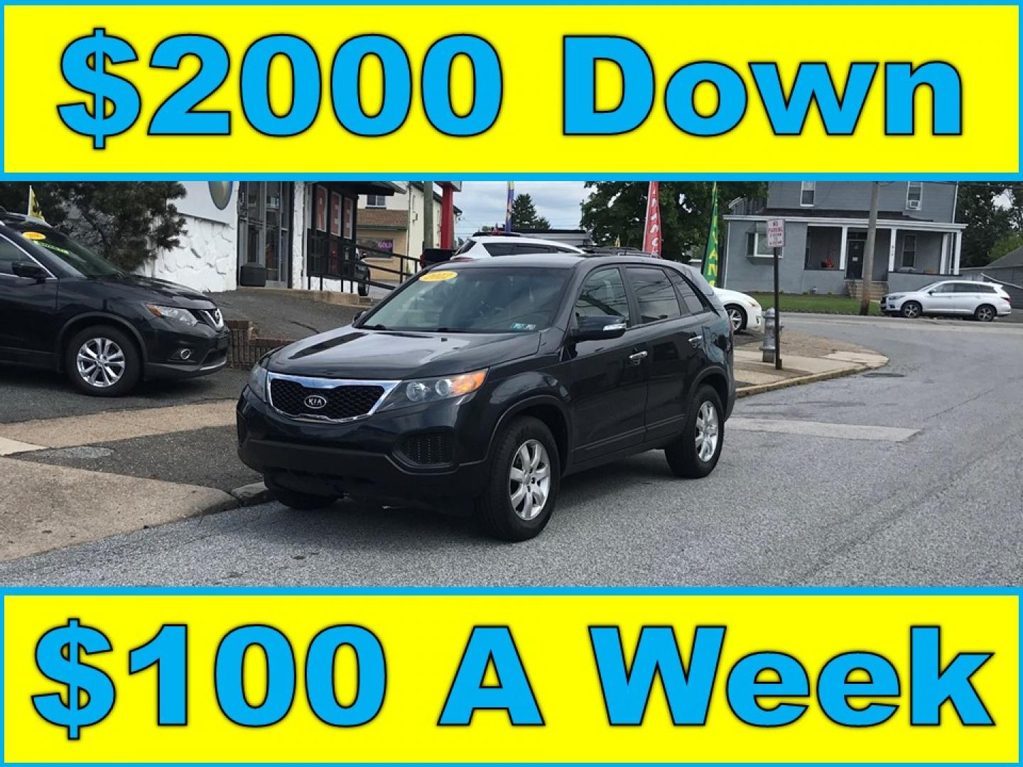 2012 Blue /Gray Kia Sorento (5XYKT3A18CG) with an 2.4 V4 engine, Automatic transmission, located at 577 Chester Pike, Prospect Park, PA, 19076, (610) 237-1015, 39.886154, -75.302338 - Photo#0