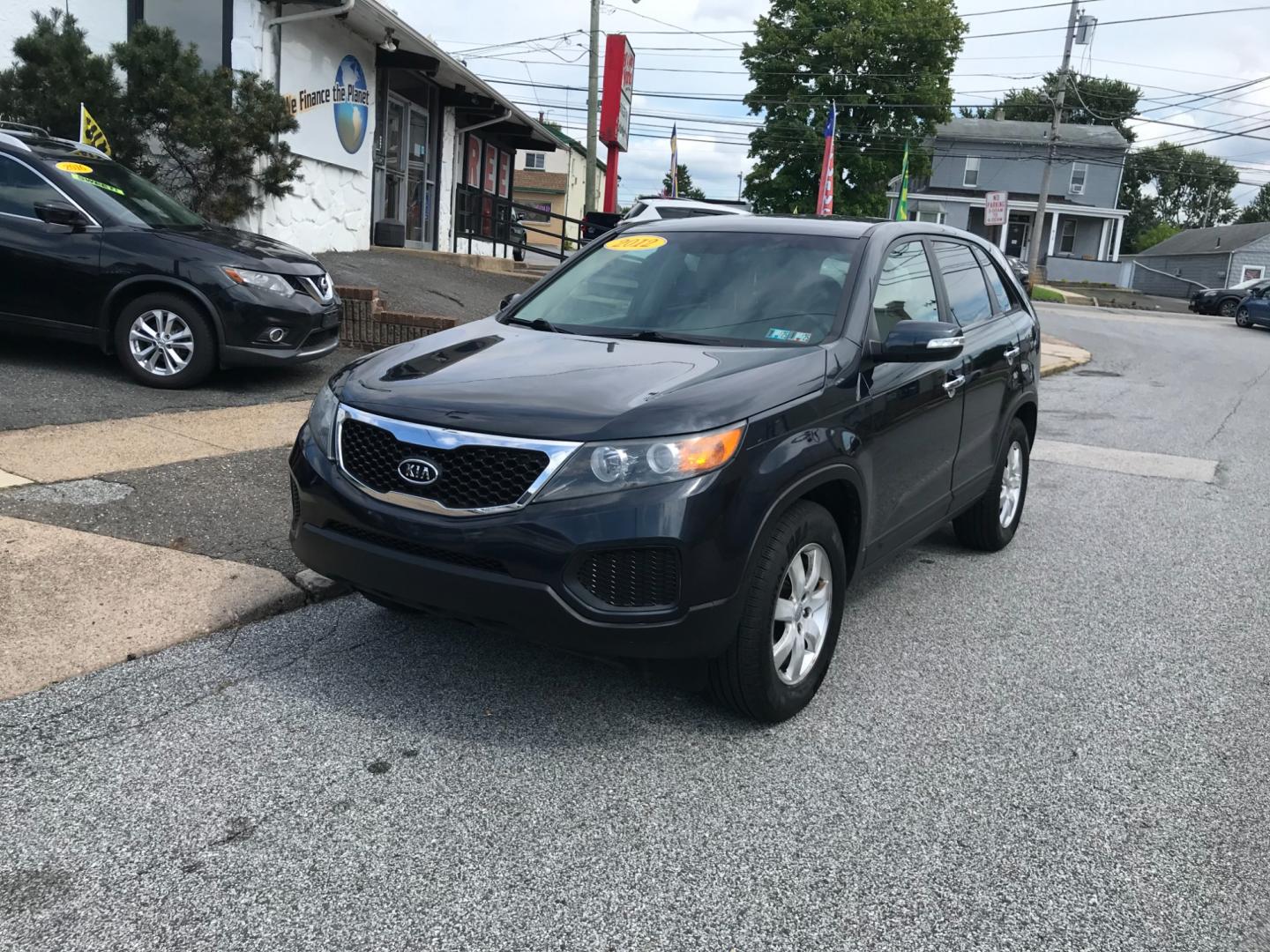 2012 Blue /Gray Kia Sorento (5XYKT3A18CG) with an 2.4 V4 engine, Automatic transmission, located at 577 Chester Pike, Prospect Park, PA, 19076, (610) 237-1015, 39.886154, -75.302338 - 2012 Kia Sorento LX: Only 116k miles, new PA inspection, SUPER CLEAN, runs LIKE NEW! This vehicle comes inspected and has been given a bumper to bumper safety check. It is very clean, reliable, and well maintained. We offer a unique pay plan that is known for being the easiest and fastest financi - Photo#2