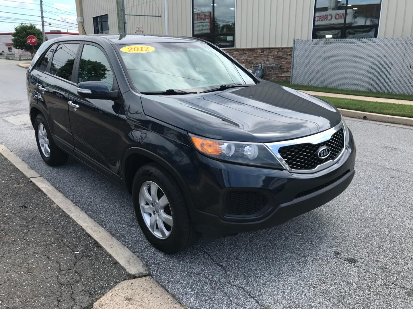 2012 Blue /Gray Kia Sorento (5XYKT3A18CG) with an 2.4 V4 engine, Automatic transmission, located at 577 Chester Pike, Prospect Park, PA, 19076, (610) 237-1015, 39.886154, -75.302338 - Photo#3