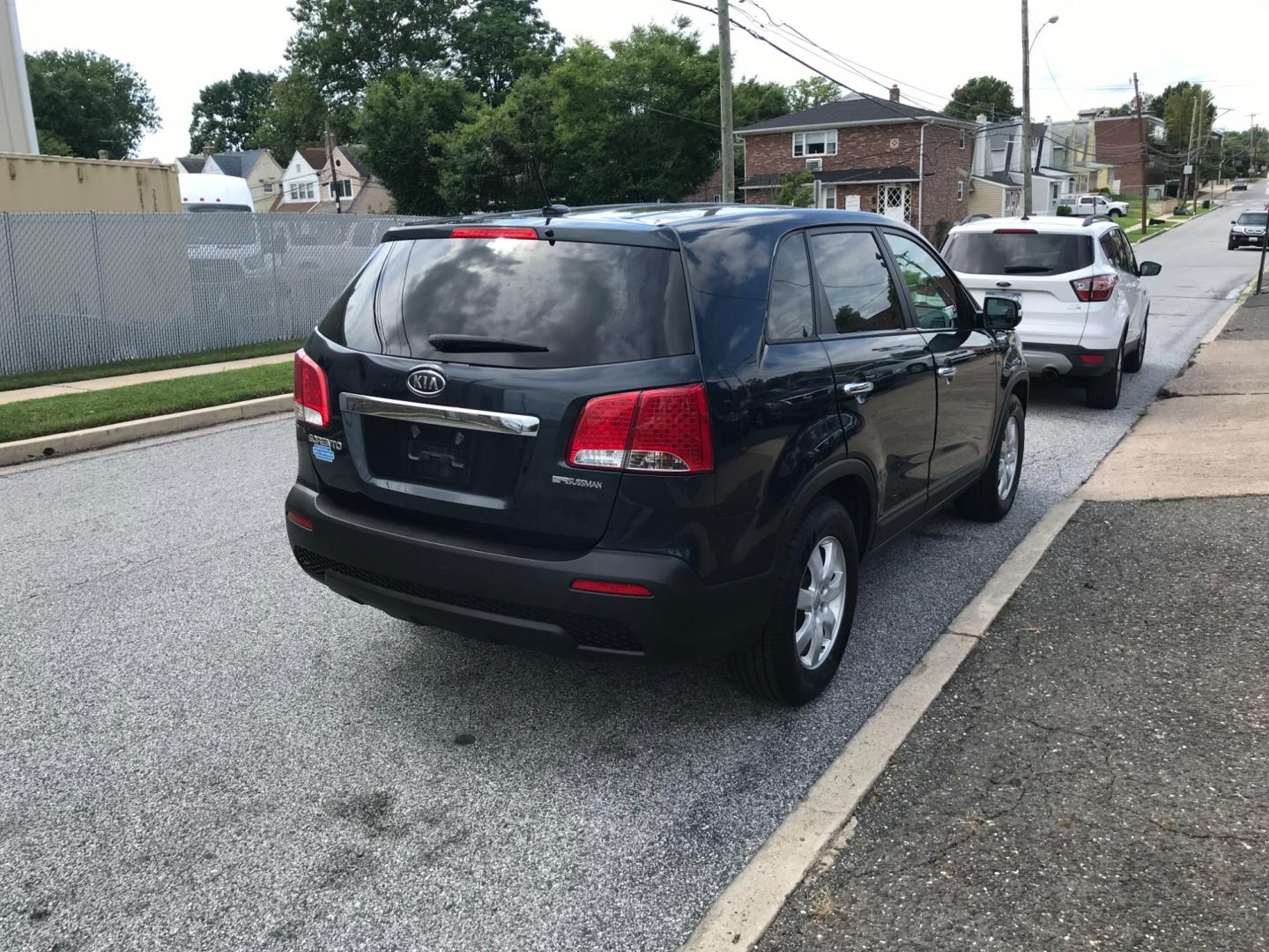 2012 Blue /Gray Kia Sorento (5XYKT3A18CG) with an 2.4 V4 engine, Automatic transmission, located at 577 Chester Pike, Prospect Park, PA, 19076, (610) 237-1015, 39.886154, -75.302338 - 2012 Kia Sorento LX: Only 116k miles, new PA inspection, SUPER CLEAN, runs LIKE NEW! This vehicle comes inspected and has been given a bumper to bumper safety check. It is very clean, reliable, and well maintained. We offer a unique pay plan that is known for being the easiest and fastest financi - Photo#4