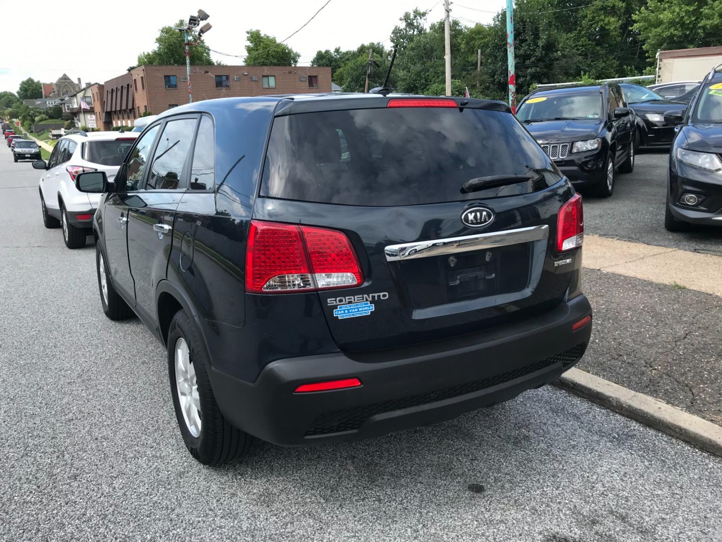 2012 Blue /Gray Kia Sorento (5XYKT3A18CG) with an 2.4 V4 engine, Automatic transmission, located at 577 Chester Pike, Prospect Park, PA, 19076, (610) 237-1015, 39.886154, -75.302338 - 2012 Kia Sorento LX: Only 116k miles, new PA inspection, SUPER CLEAN, runs LIKE NEW! This vehicle comes inspected and has been given a bumper to bumper safety check. It is very clean, reliable, and well maintained. We offer a unique pay plan that is known for being the easiest and fastest financi - Photo#5