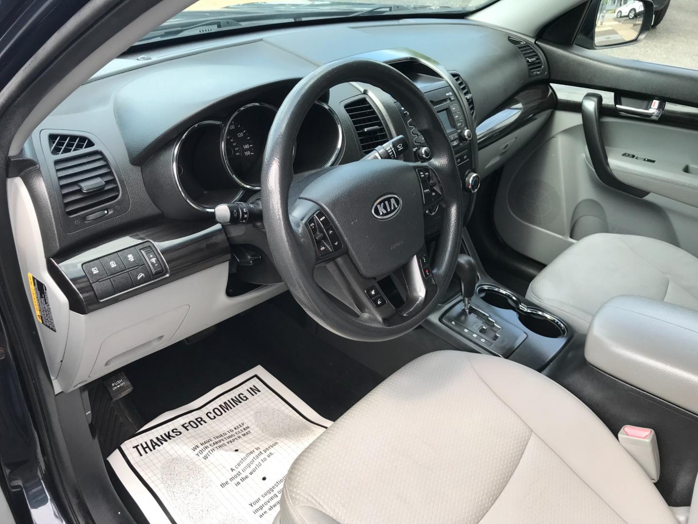 2012 Blue /Gray Kia Sorento (5XYKT3A18CG) with an 2.4 V4 engine, Automatic transmission, located at 577 Chester Pike, Prospect Park, PA, 19076, (610) 237-1015, 39.886154, -75.302338 - 2012 Kia Sorento LX: Only 116k miles, new PA inspection, SUPER CLEAN, runs LIKE NEW! This vehicle comes inspected and has been given a bumper to bumper safety check. It is very clean, reliable, and well maintained. We offer a unique pay plan that is known for being the easiest and fastest financi - Photo#9