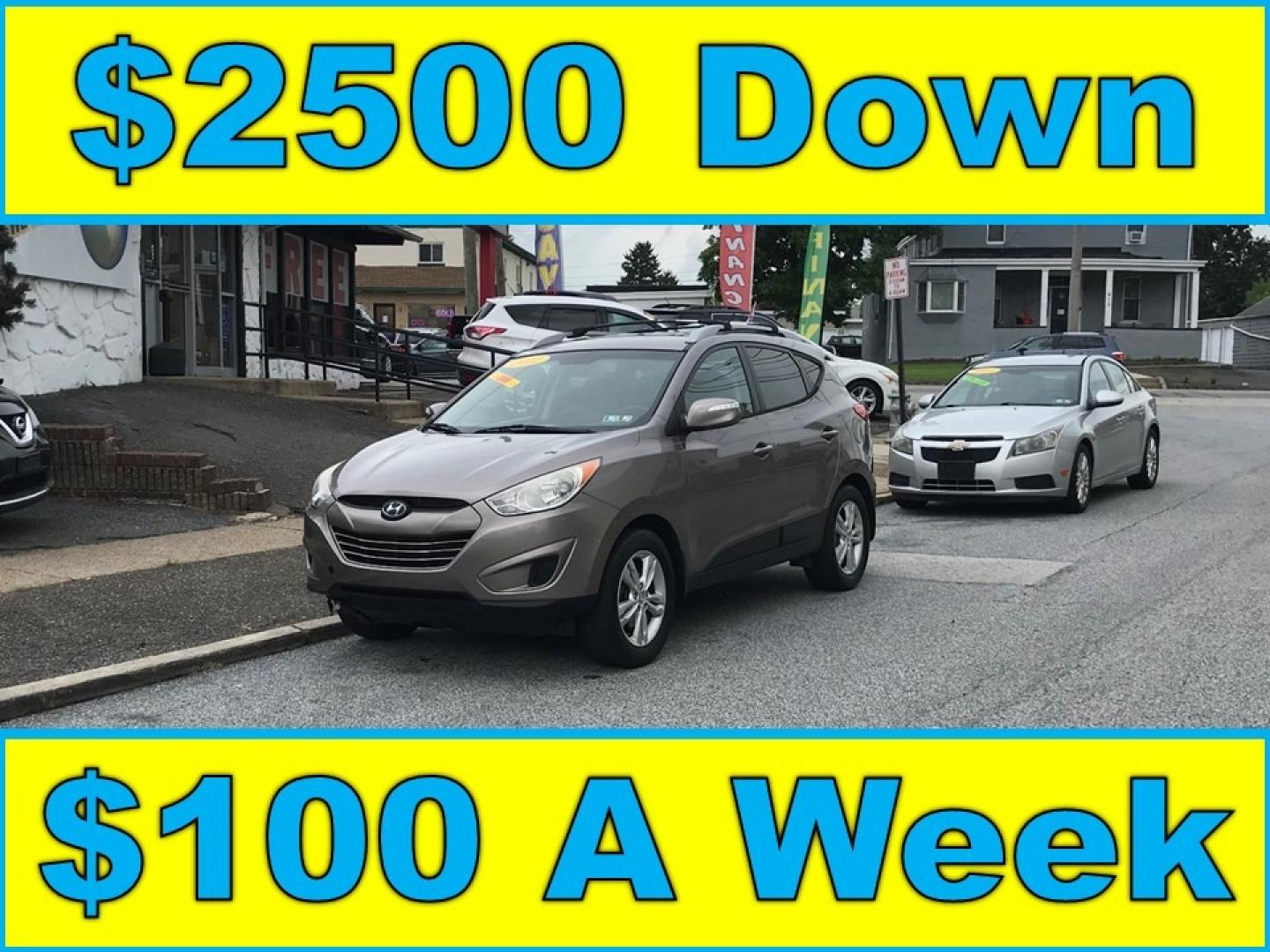 2012 Brown /Gray Hyundai Tucson GLS (KM8JUCAC7CU) with an 2.4 V4 engine, Automatic transmission, located at 577 Chester Pike, Prospect Park, PA, 19076, (610) 237-1015, 39.886154, -75.302338 - Photo#0