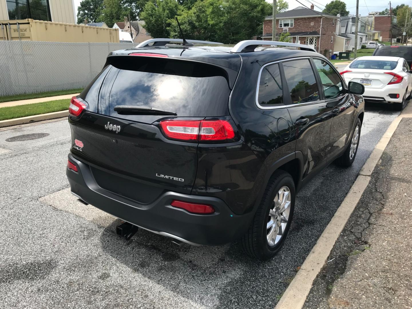 2014 Black /Black Jeep Cherokee Limited (1C4PJMDS4EW) with an 3.2 V6 engine, Automatic transmission, located at 577 Chester Pike, Prospect Park, PA, 19076, (610) 237-1015, 39.886154, -75.302338 - 2014 Jeep Cherokee Limited: Navigation system, backup camera, sunroof, 4x4, new PA inspection, SUPER CLEAN and runs LIKE NEW! This vehicle comes inspected and has been given a bumper to bumper safety check. It is very clean, reliable, and well maintained. We offer a unique pay plan that is known - Photo#4