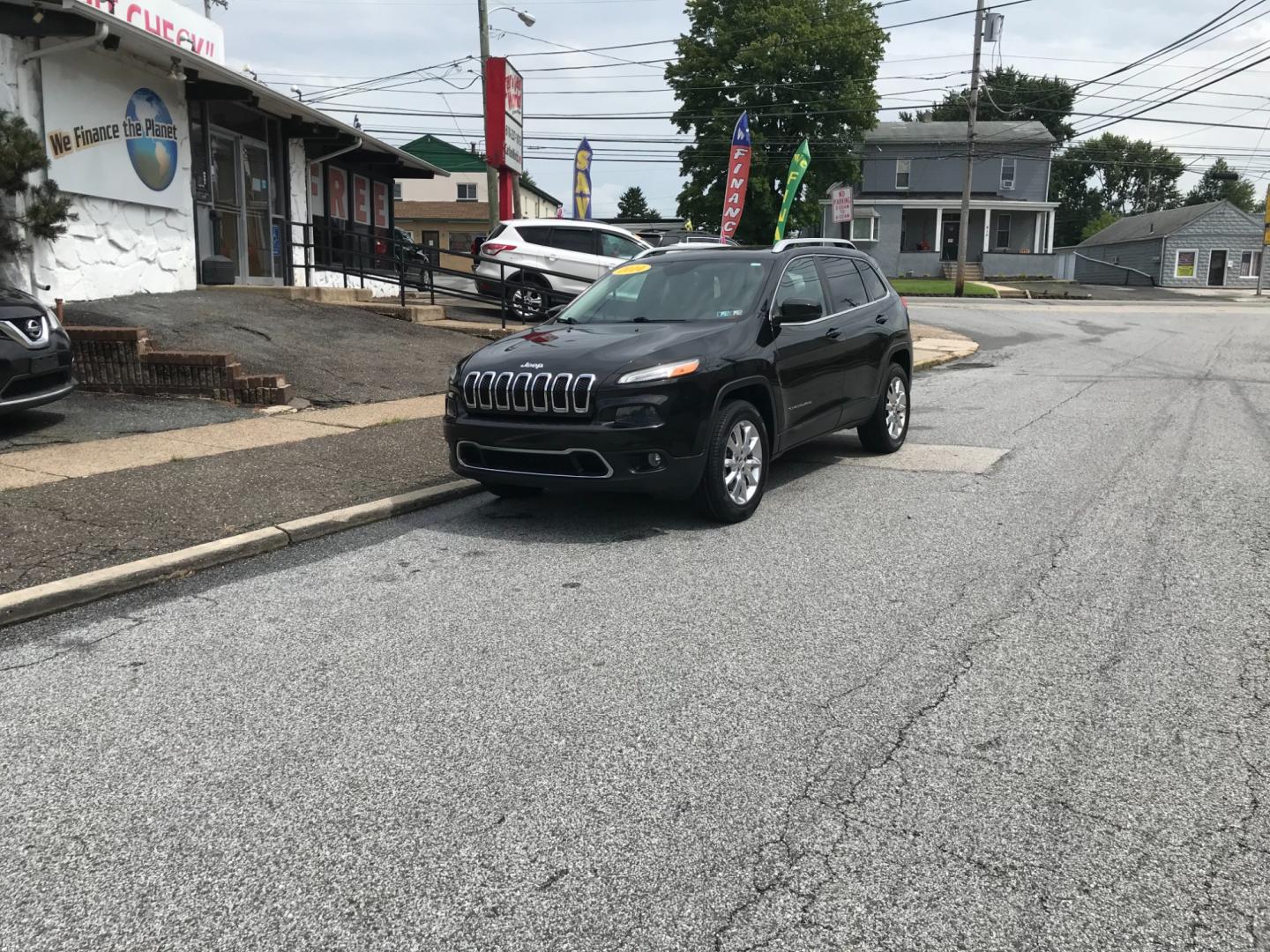 2014 Black /Black Jeep Cherokee Limited (1C4PJMDS4EW) with an 3.2 V6 engine, Automatic transmission, located at 577 Chester Pike, Prospect Park, PA, 19076, (610) 237-1015, 39.886154, -75.302338 - Photo#1