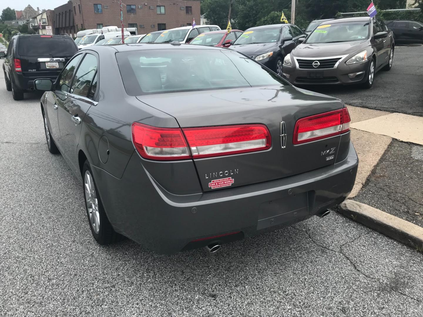 2011 Brown /Black Lincoln MKZ (3LNHL2JC3BR) with an 3.5 V6 engine, Automatic transmission, located at 577 Chester Pike, Prospect Park, PA, 19076, (610) 237-1015, 39.886154, -75.302338 - 2011 Lincoln MKZ: AWD, sunroof, new PA inspection, black leather, runs LIKE NEW! This vehicle comes inspected and has been given a bumper to bumper safety check. It is very clean, reliable, and well maintained. We offer a unique pay plan that is known for being the easiest and fastest financing o - Photo#5