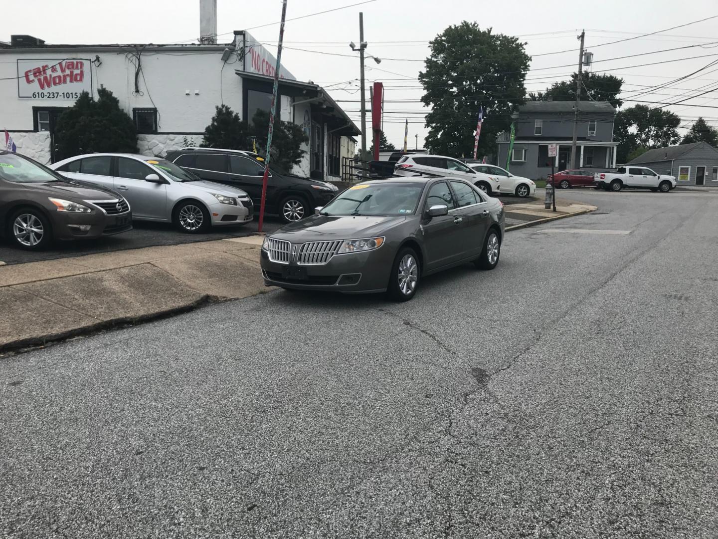 2011 Brown /Black Lincoln MKZ (3LNHL2JC3BR) with an 3.5 V6 engine, Automatic transmission, located at 577 Chester Pike, Prospect Park, PA, 19076, (610) 237-1015, 39.886154, -75.302338 - Photo#1