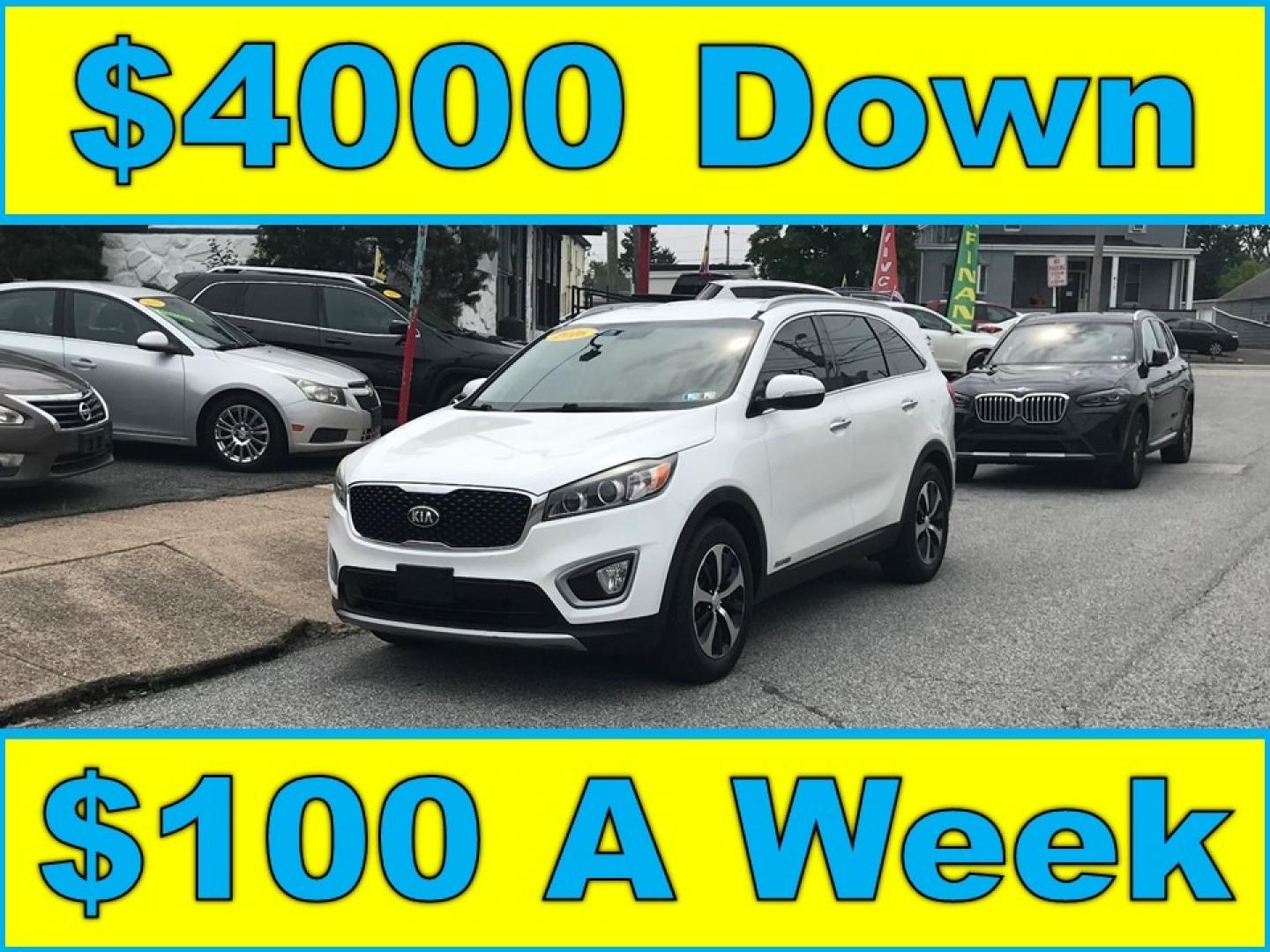 2016 White /Black Kia Sorento EX (5XYPHDA58GG) with an 3.3 V6 engine, Automatic transmission, located at 577 Chester Pike, Prospect Park, PA, 19076, (610) 237-1015, 39.886154, -75.302338 - Photo#0