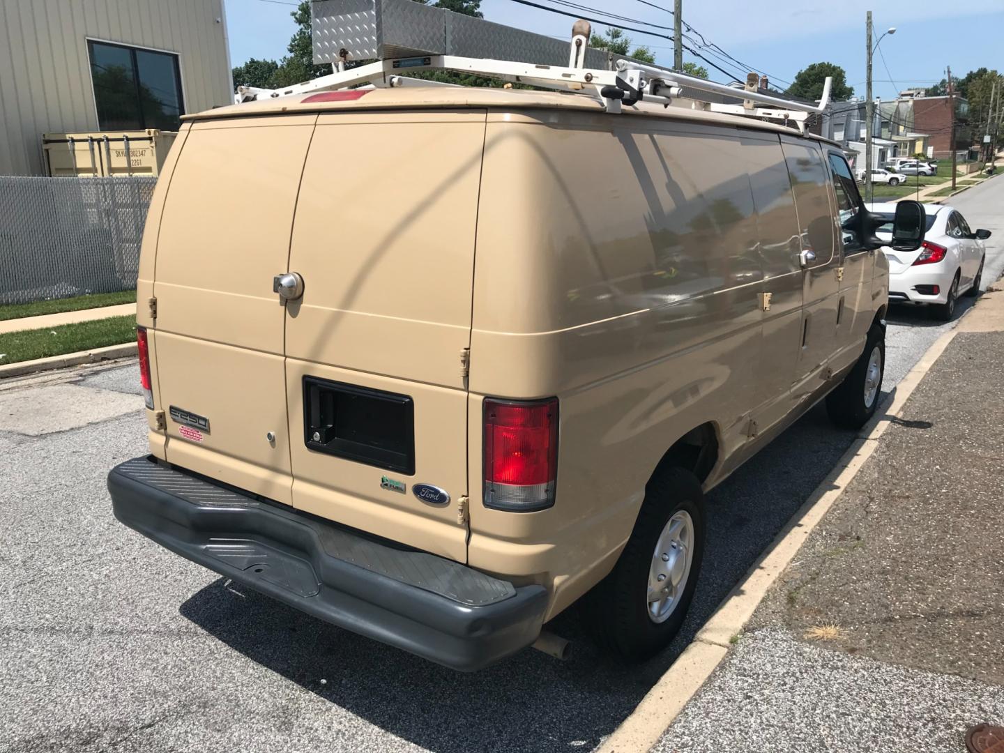 2013 Ford E-Series Van E250 (1FTNE2EW5DD) with an 4.8 V8 engine, Automatic transmission, located at 577 Chester Pike, Prospect Park, PA, 19076, (610) 237-1015, 39.886154, -75.302338 - 2013 Ford Econoline E250 Cargo Van: Ladder racks, shelving, no windows, heavy duty partition, FLEET MAINTAINED, runs LIKE NEW! This vehicle comes inspected and has been given a bumper to bumper safety check. It is very clean, reliable, and well maintained. We offer a unique pay plan that is known - Photo#4