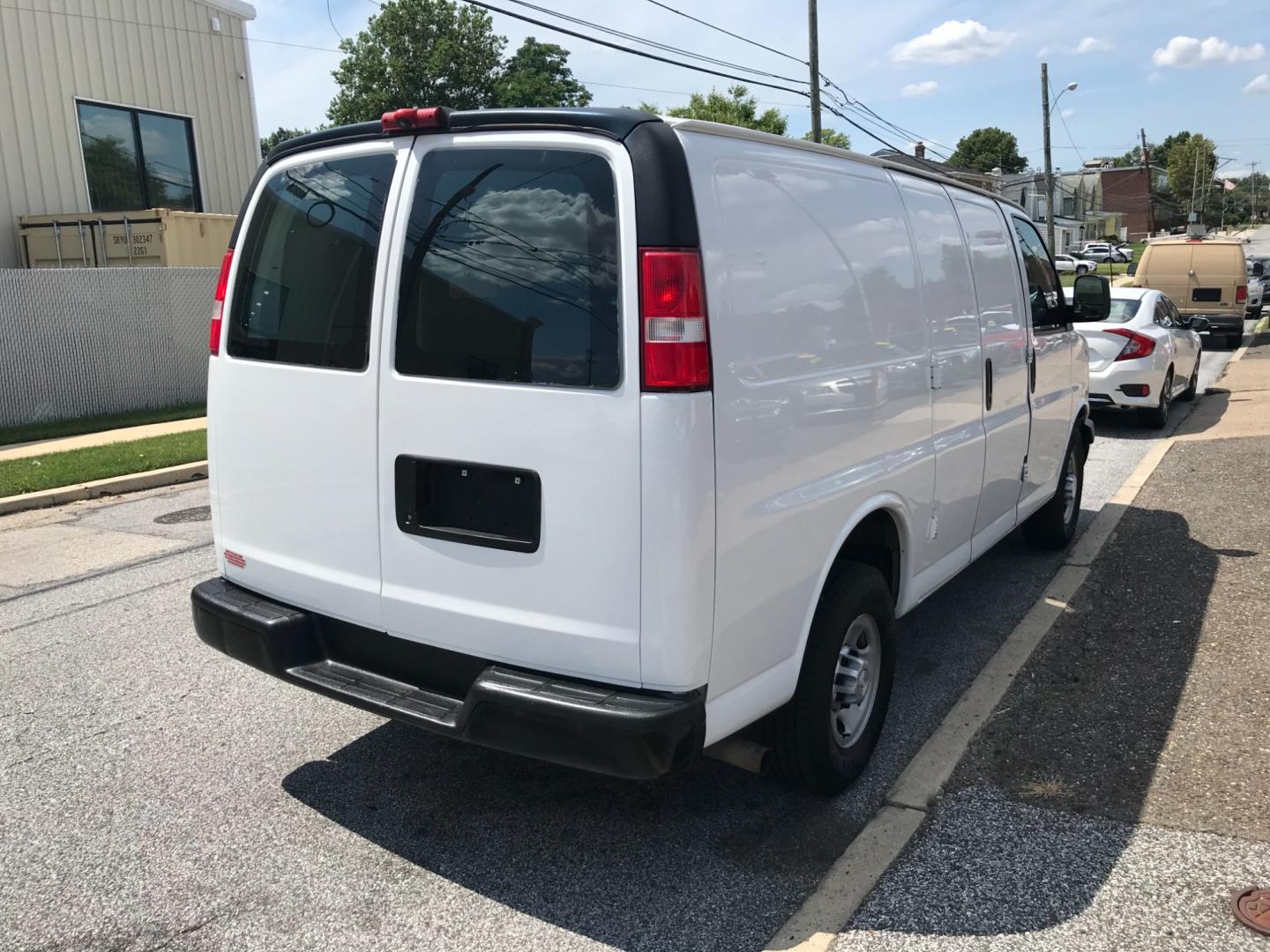 2017 White /Gray Chevrolet Express 2500 (1GCWGAFFXH1) with an 4.8 V8 engine, Automatic transmission, located at 577 Chester Pike, Prospect Park, PA, 19076, (610) 237-1015, 39.886154, -75.302338 - 2017 Chevy Express 2500 Cargo Van: Shelving, nice radio, heavy duty partition, power locks and windows, FLEET MAINTAINED, runs LIKE NEW! This vehicle comes inspected and has been given a bumper to bumper safety check. It is very clean, reliable, and well maintained. We offer a unique pay plan tha - Photo#4