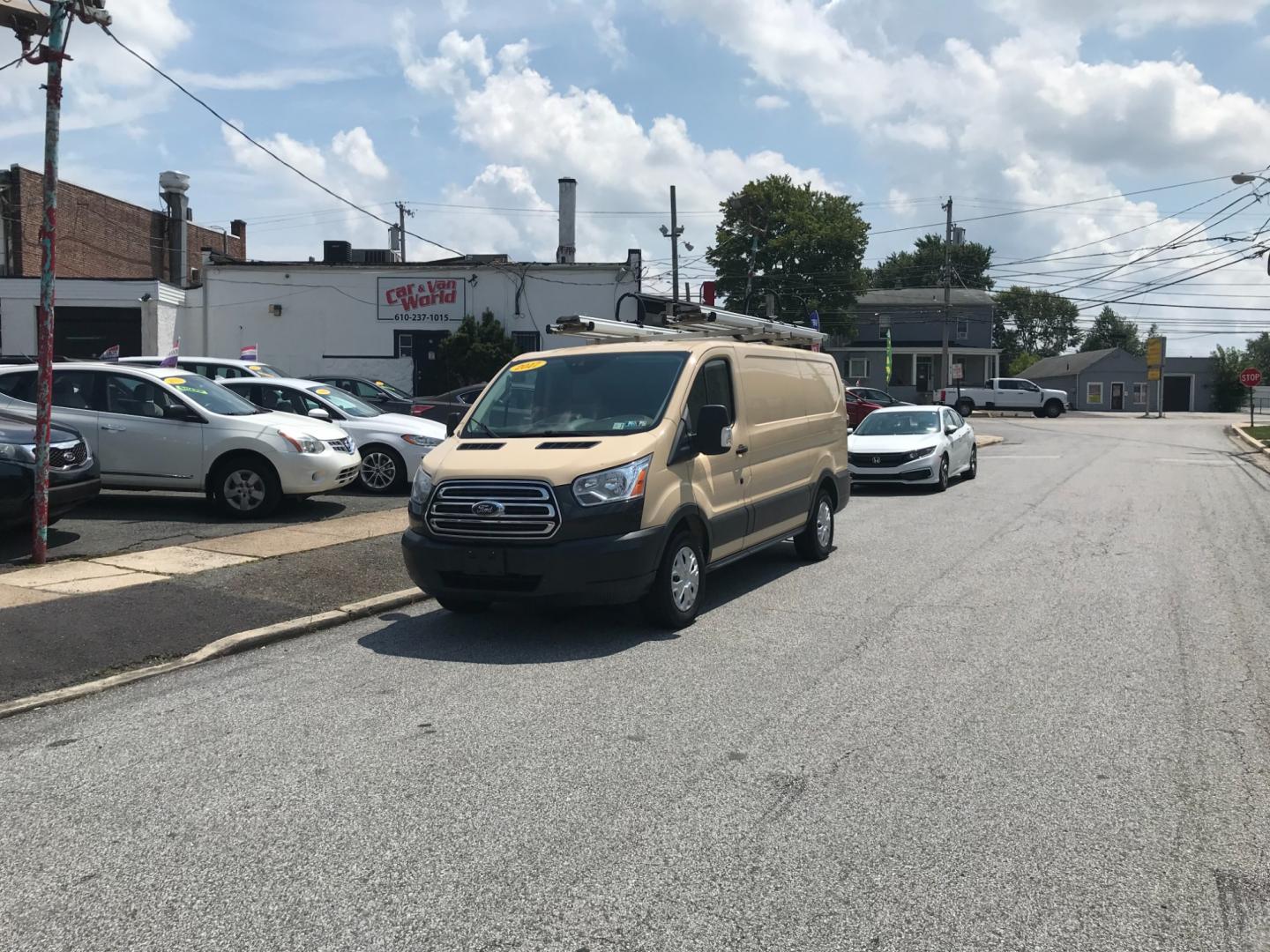 2017 Tan /Gray Ford Transit 150 (1FTYE1YM2HK) with an 3.7 V6 engine, Automatic transmission, located at 577 Chester Pike, Prospect Park, PA, 19076, (610) 237-1015, 39.886154, -75.302338 - Photo#1