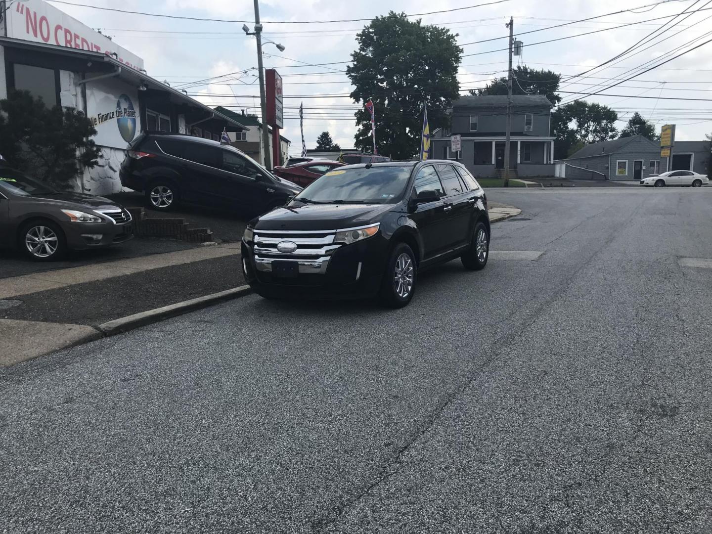 2011 Black /Black Ford Edge SEL AWD (2FMDK4JC7BB) with an 3.5L V6 DOHC 24V engine, 6-Speed Automatic transmission, located at 577 Chester Pike, Prospect Park, PA, 19076, (610) 237-1015, 39.886154, -75.302338 - Photo#1