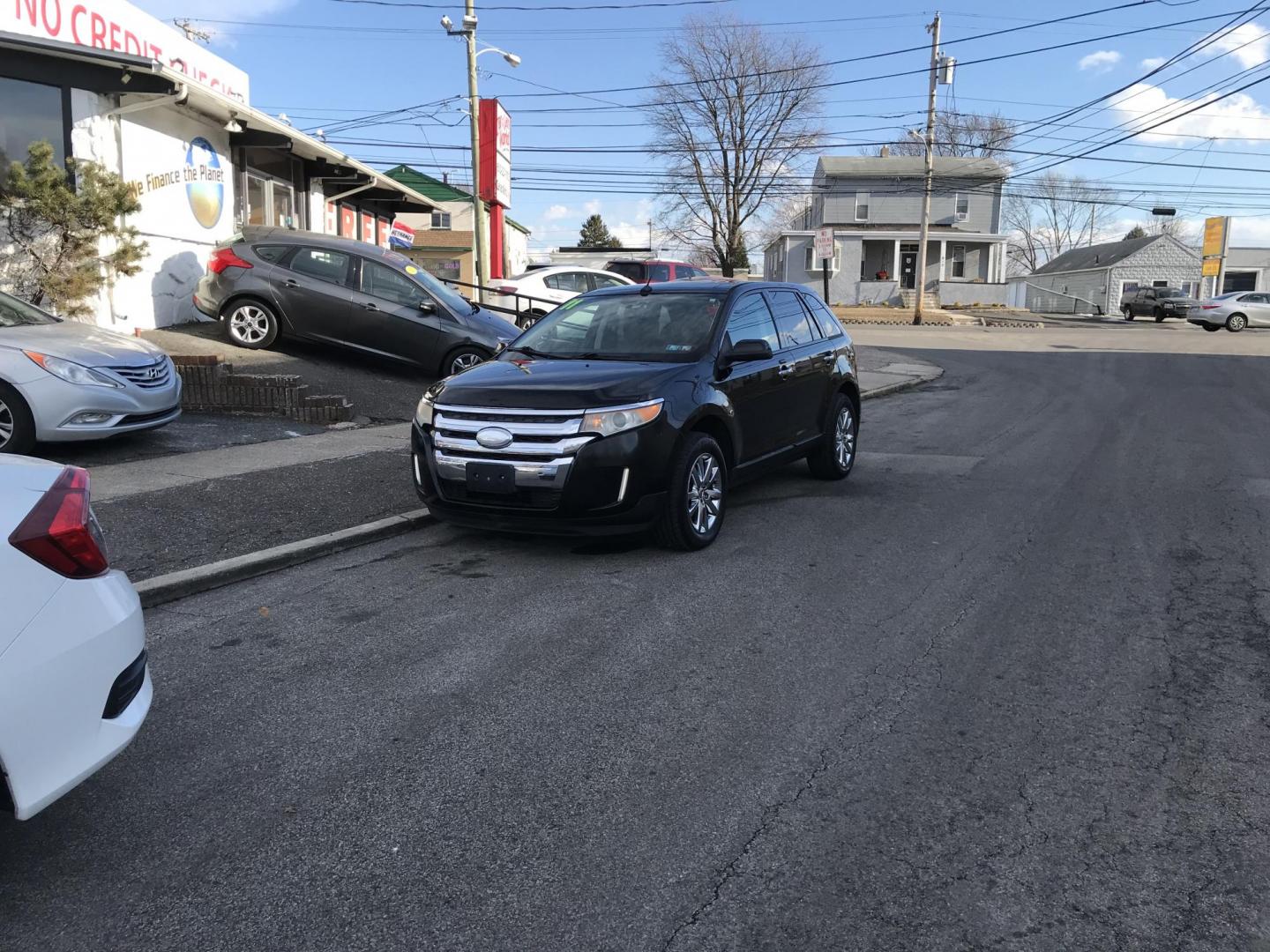 2011 Black /Black Ford Edge SEL AWD (2FMDK4JC7BB) with an 3.5L V6 DOHC 24V engine, 6-Speed Automatic transmission, located at 577 Chester Pike, Prospect Park, PA, 19076, (610) 237-1015, 39.886154, -75.302338 - Photo#1