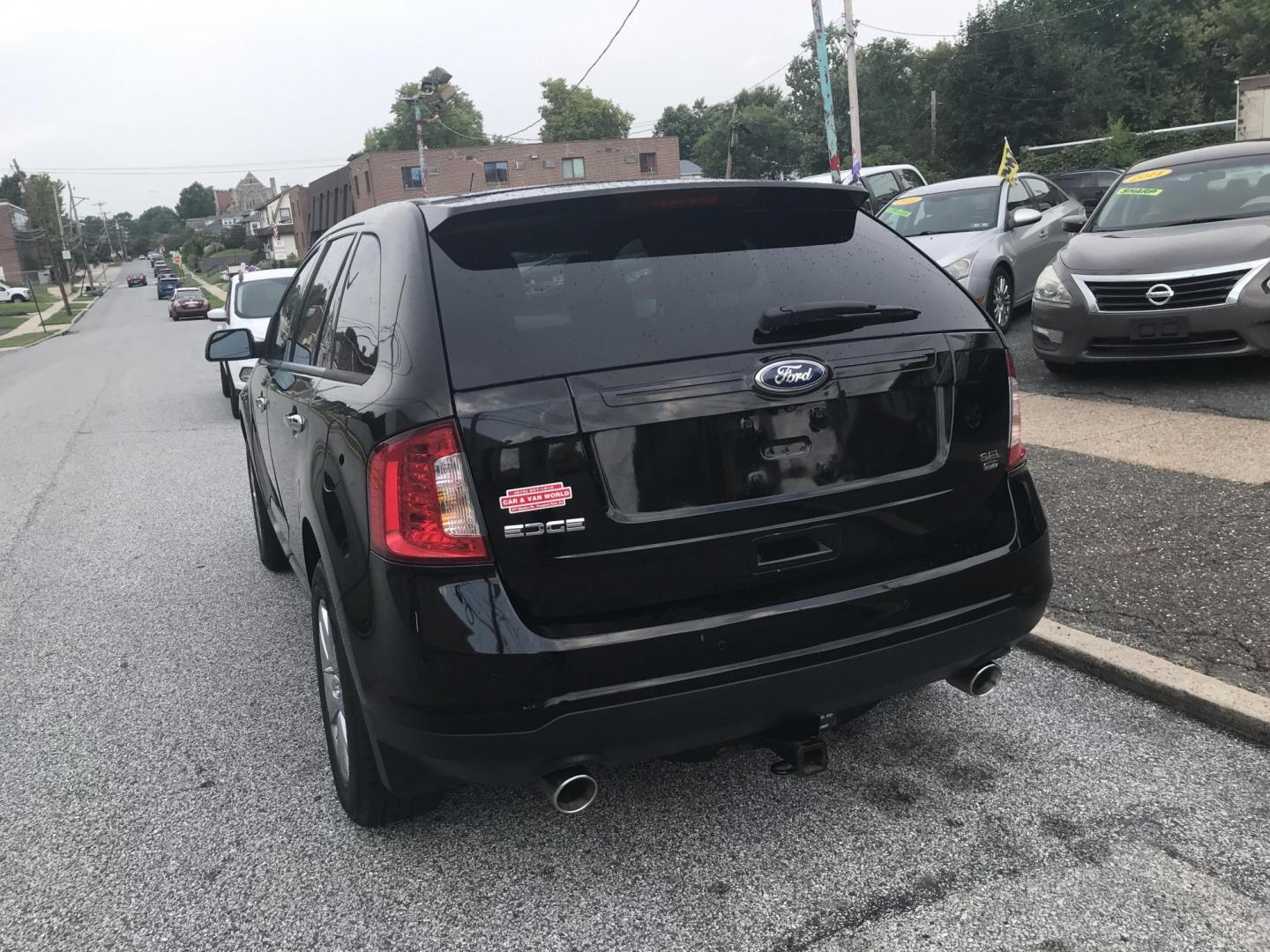 2011 Black /Black Ford Edge SEL AWD (2FMDK4JC7BB) with an 3.5L V6 DOHC 24V engine, 6-Speed Automatic transmission, located at 577 Chester Pike, Prospect Park, PA, 19076, (610) 237-1015, 39.886154, -75.302338 - Photo#6