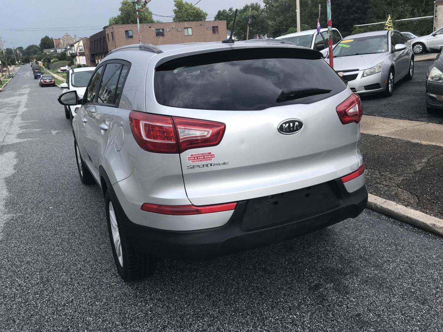 2011 Silver /Black Kia Sportage LX (KNDPB3A28B7) with an 2.4L V6 DOHC 24V engine, Automatic transmission, located at 577 Chester Pike, Prospect Park, PA, 19076, (610) 237-1015, 39.886154, -75.302338 - Photo#5