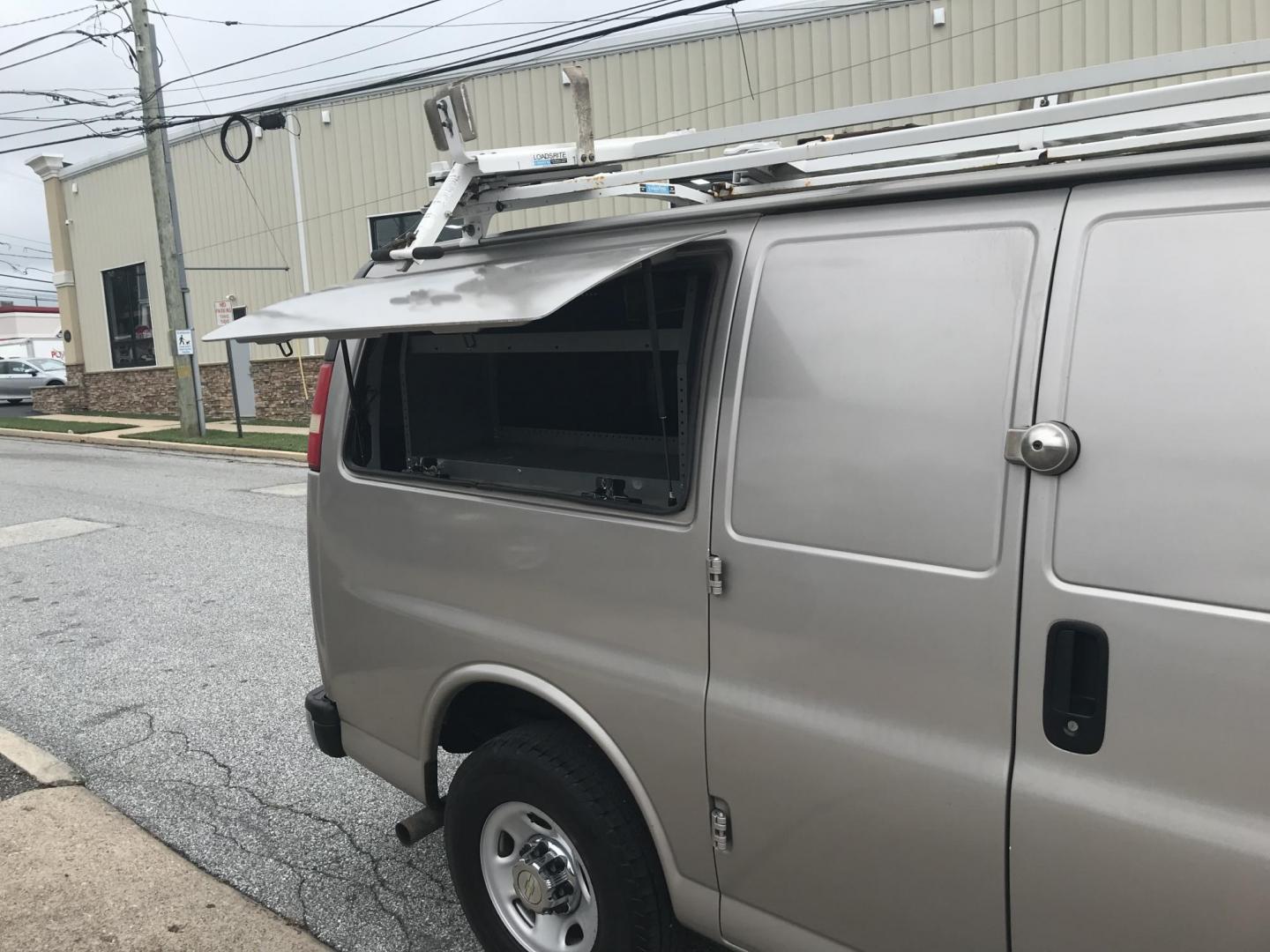 2014 Pewter /Gray Chevrolet Express 3500 Cargo (1GCZGTCG3E1) with an 6.0L V8 OHV 16V FFV engine, 6-Speed Automatic transmission, located at 577 Chester Pike, Prospect Park, PA, 19076, (610) 237-1015, 39.886154, -75.302338 - Photo#22